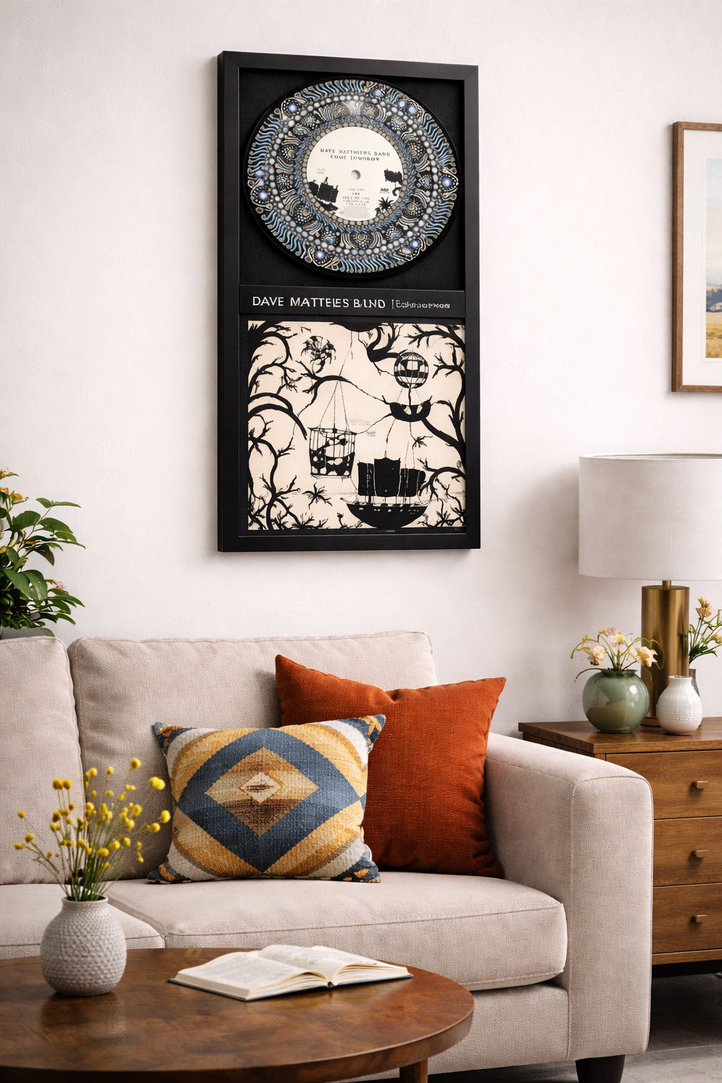 Dave Matthews vinyl art framed in a Large Dual Frame and shown hanging over a couch.