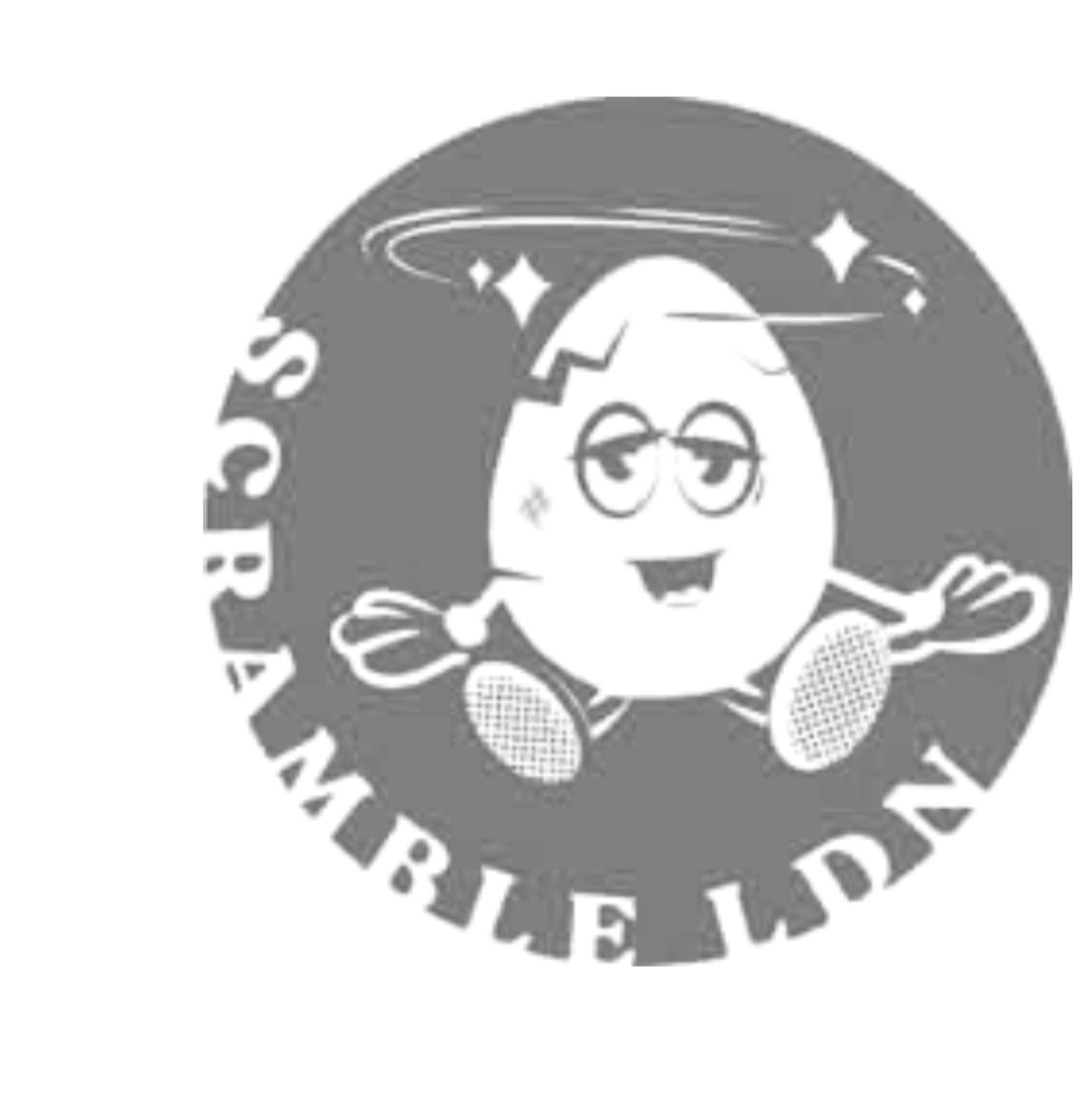 A silver-colored emblem featuring a smiling cartoonish face, with round eyes, a broad smile, and a circular border with text.