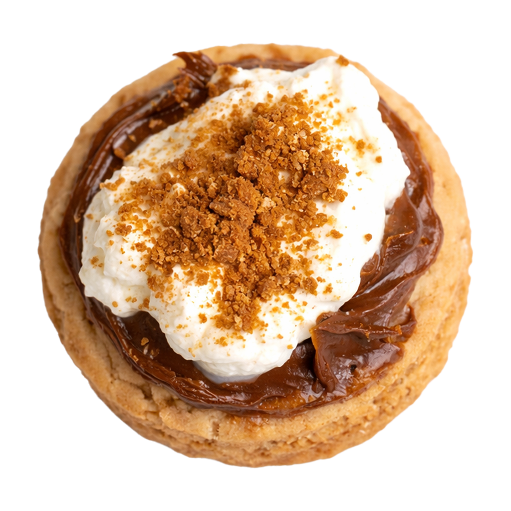 Close-up of a dessert tart topped with whipped cream, chocolate filling, and crushed cookies or biscuits on a round crust.