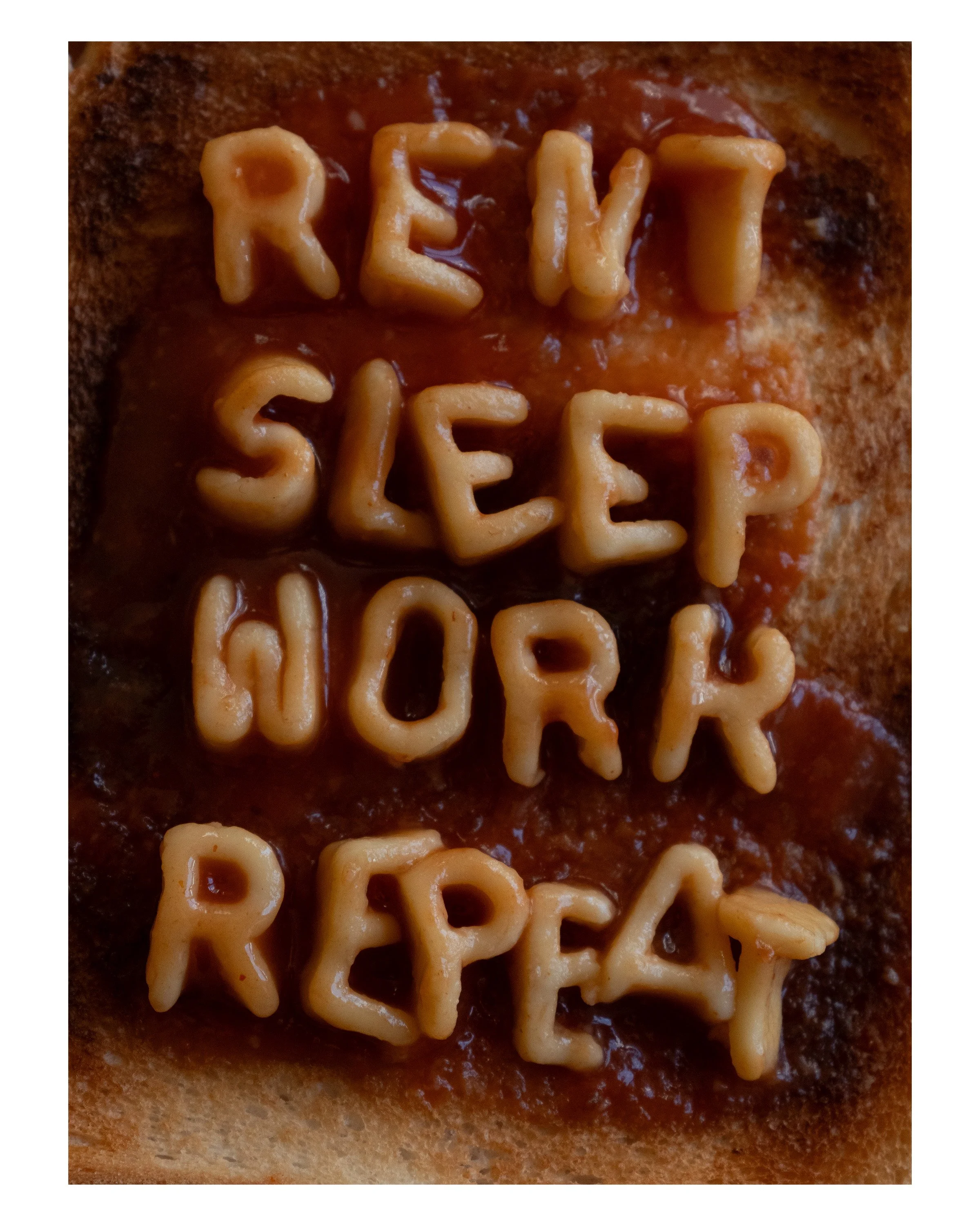 RENT SLEEP WORK REPEAT Photographic print