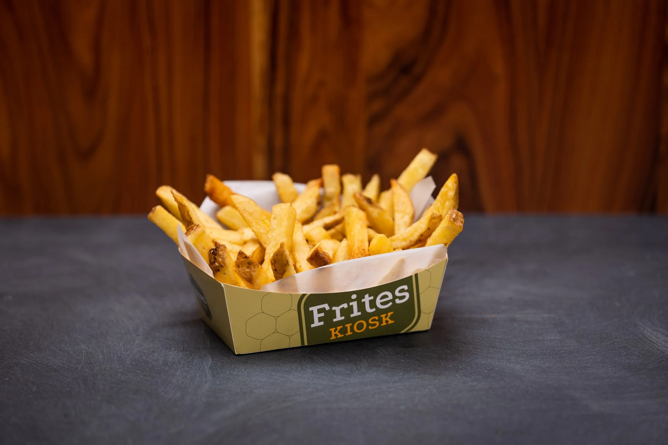 Ontwerp van logo, huisstijl en verpakkingsmaterialen voor de Frites Kiosk