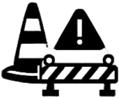 Verkehrszeichen und Barrikade am Straßenrand