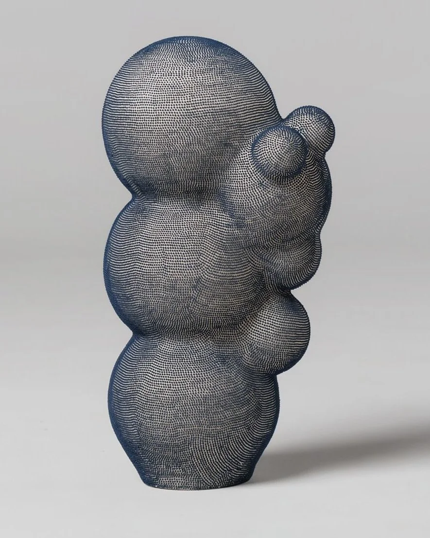 Mamanas V.  Side view of stoneware sculpture with hand-applied blue engobe dots and organic rounded volumes.