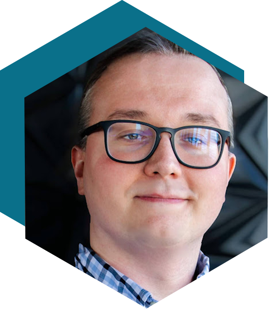 Man with glasses within a hexagonal shape