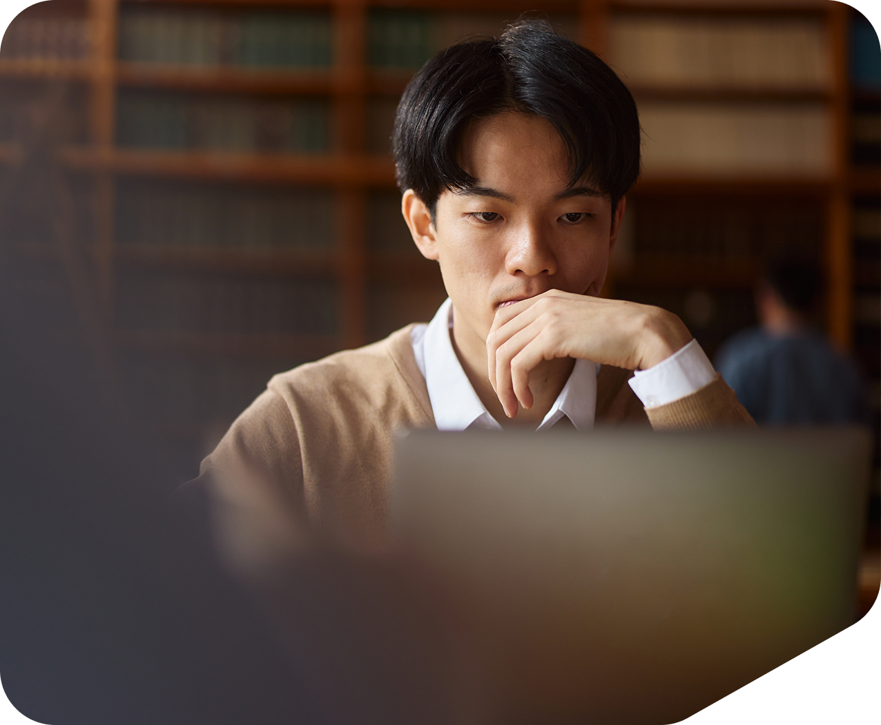 Asian student at computer