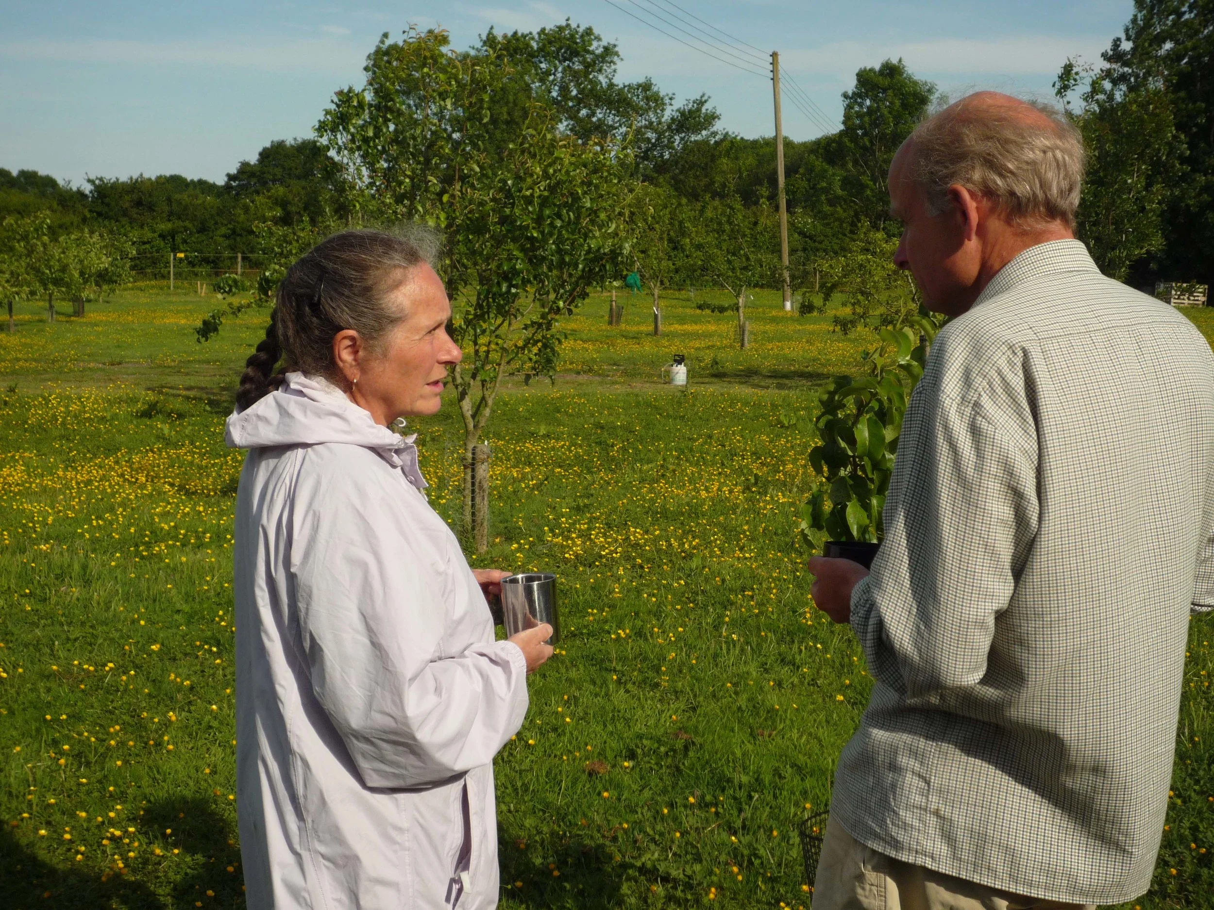 couple enjoying tea in orchard for web.jpg