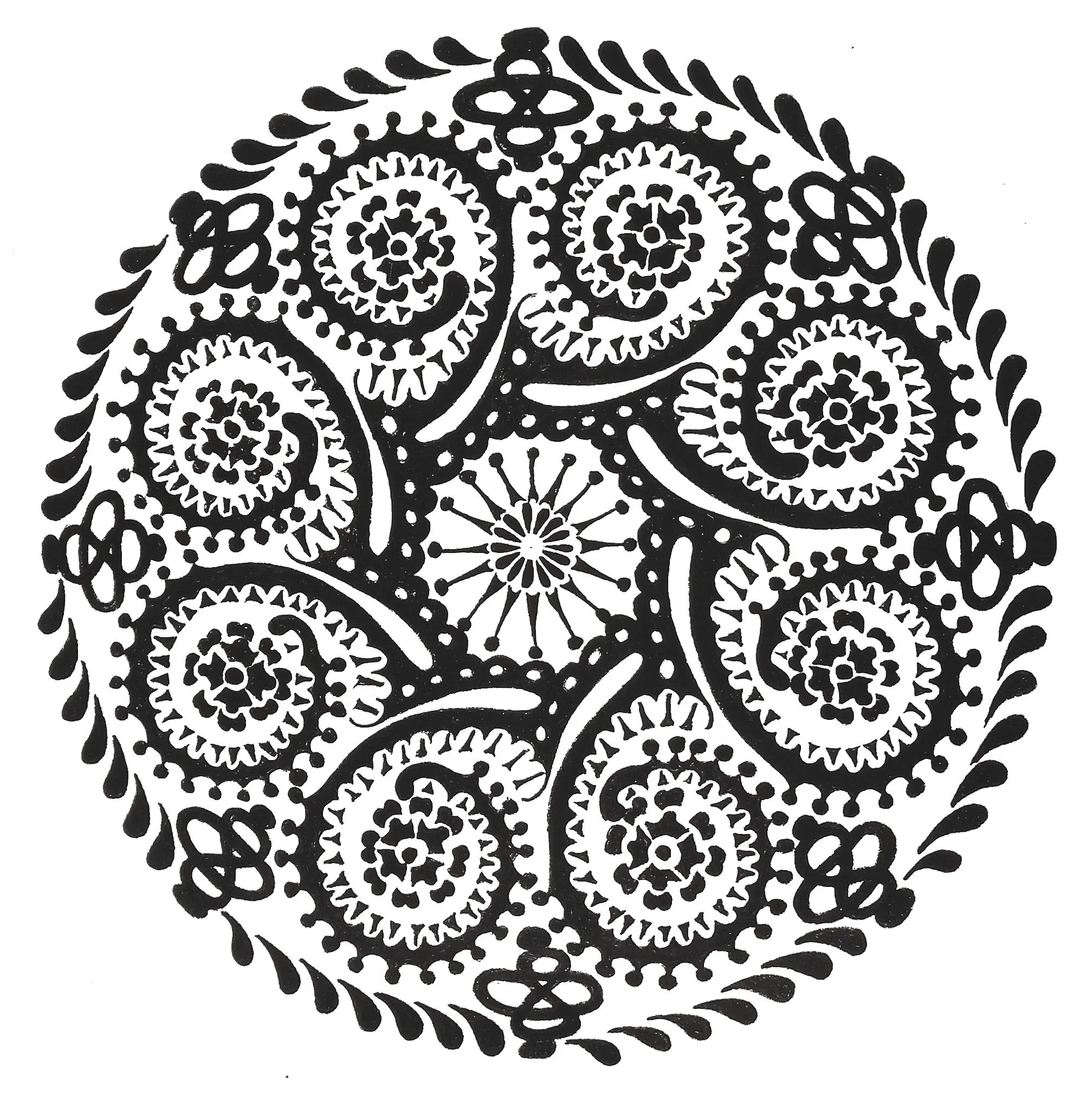 Black and white circular floral pattern with intricate swirl and leaf motifs.