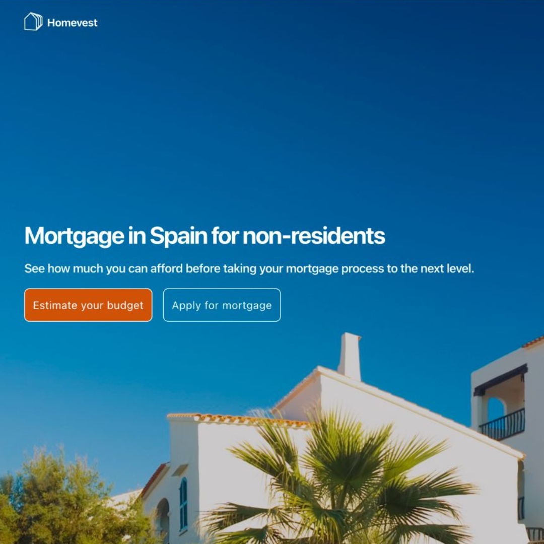 Homepage of Homevest website with a background of a white house and a palm tree under a clear blue sky, featuring options to estimate a mortgage budget or apply for a mortgage in Spain for non-residents.