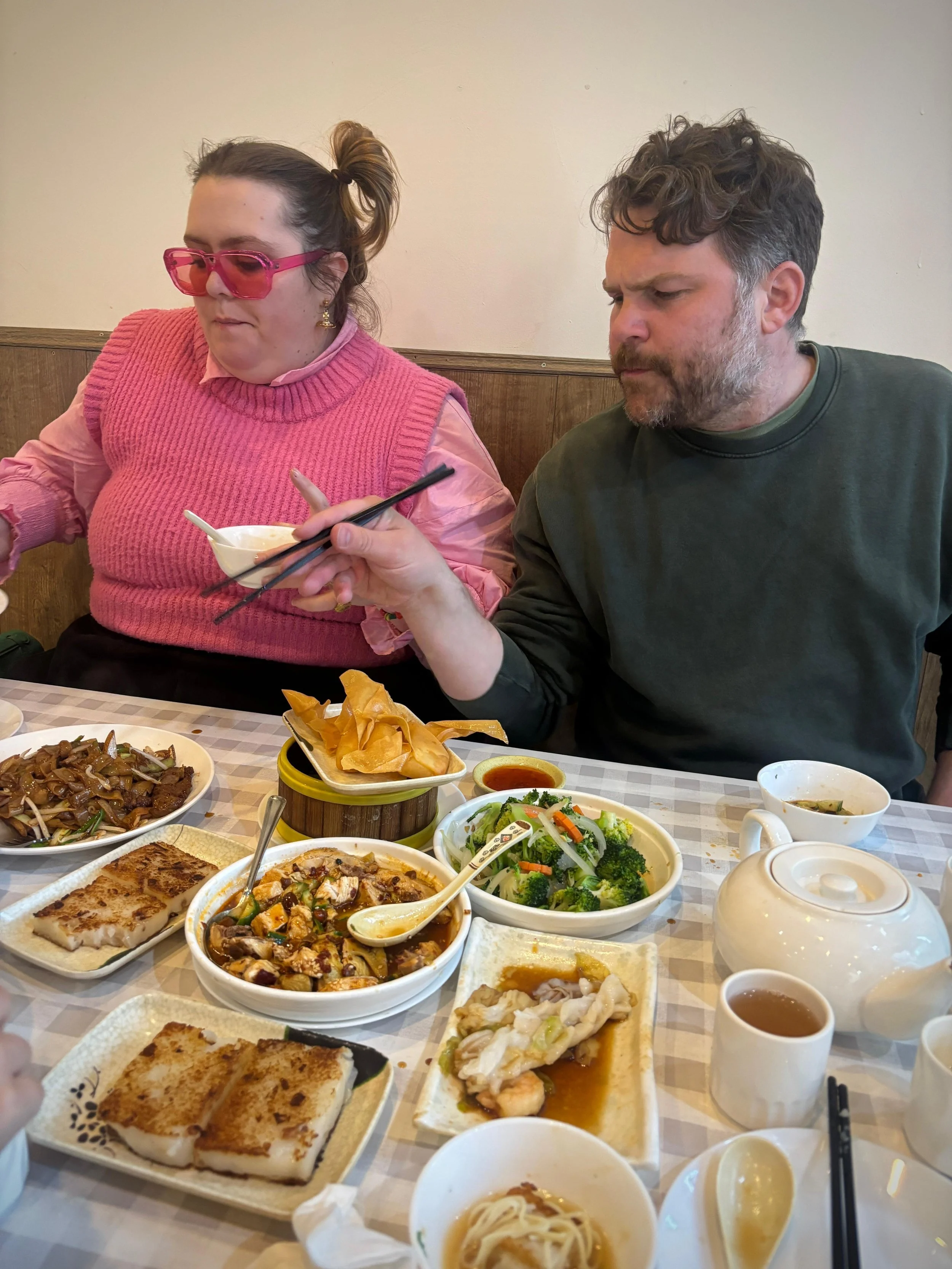 Jayde Adams and Josh Eggleton eating at Fresh Bakery Bristol filming Centre of the Universe, 2026