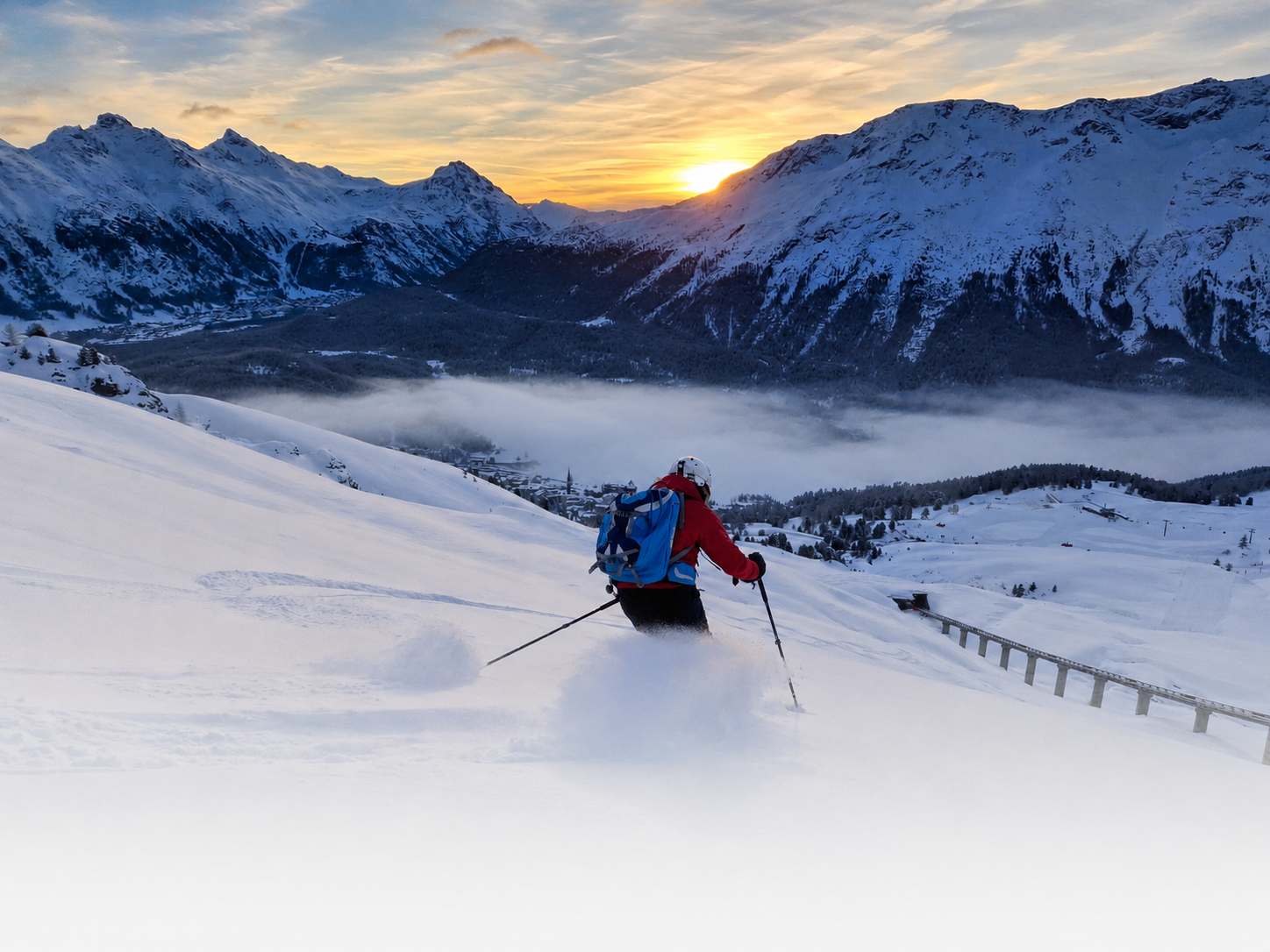 A ski-instructor skiing towards the sunrise in St. Moritz above the clouds in powder.