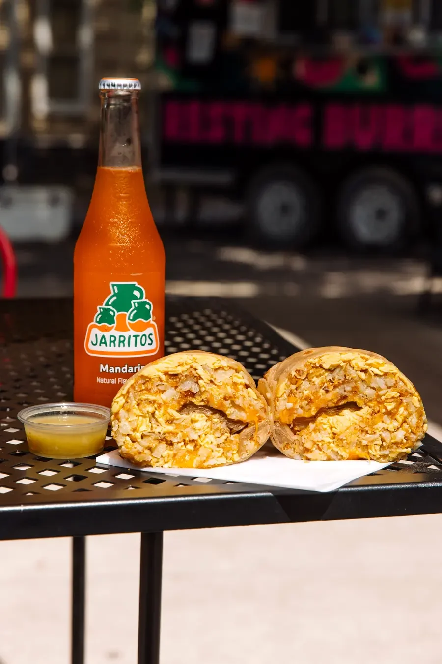 Breakfast burrito with Jarritos soda at Resting Burrito Face food truck in Nashville