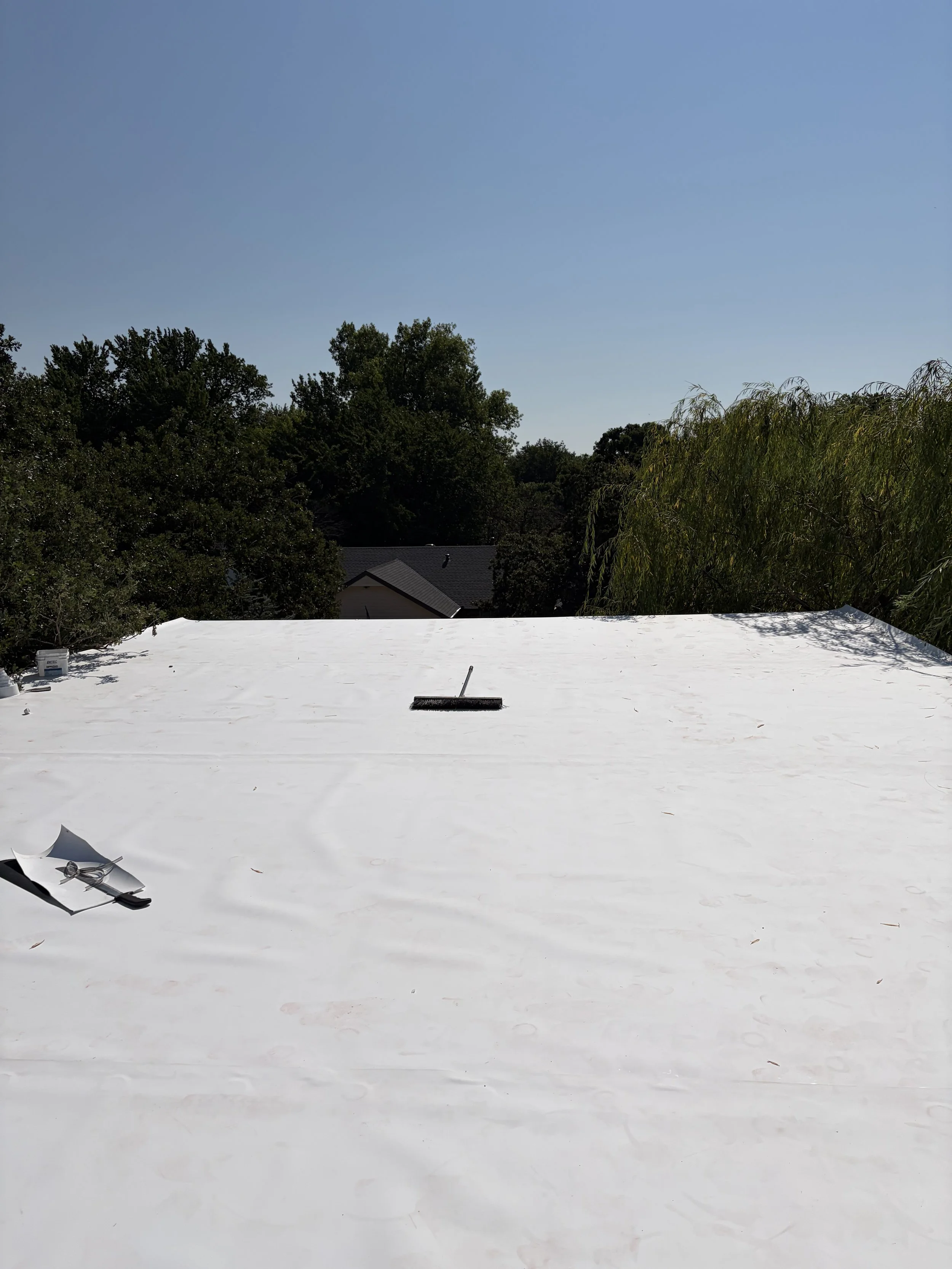 Completed residential flat roof replacement by Bulldog Restoration, providing dependable protection against Oklahoma rain, wind, hail, and severe storms. Whether a flat roof requires storm damage repair, leak repair, or complete replacement, addressi
