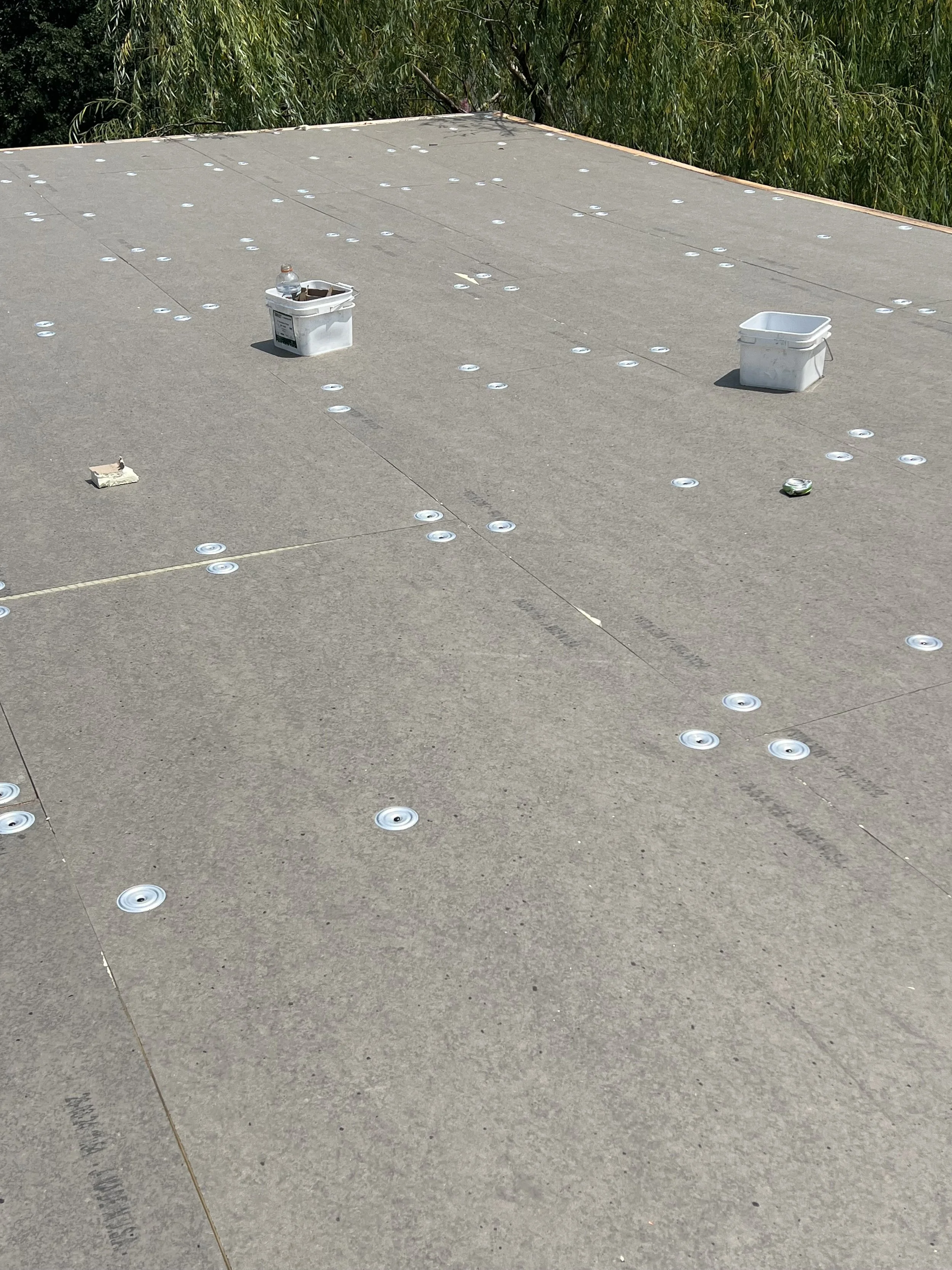 TPO Flat Roof Replacement in Progress

New residential flat roofing system being installed by Bulldog Restoration. TPO and other low-slope roofing systems can provide durable protection for homes, additions, garages, patios, and other residential fla