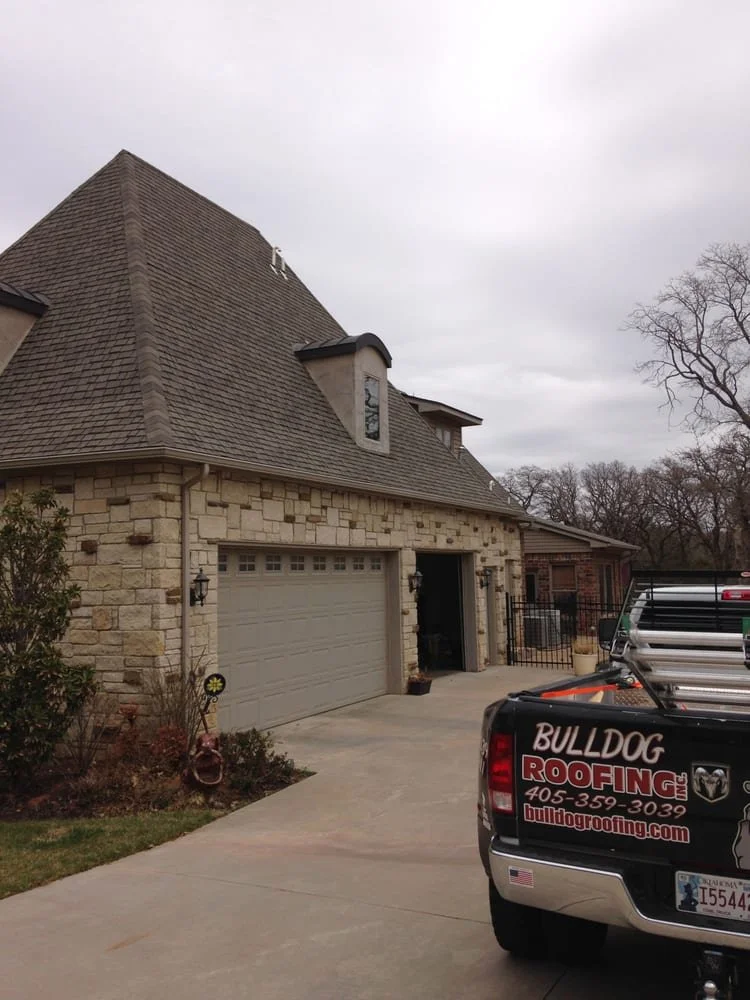 residential roof repair on a luxury home in Oklahoma City