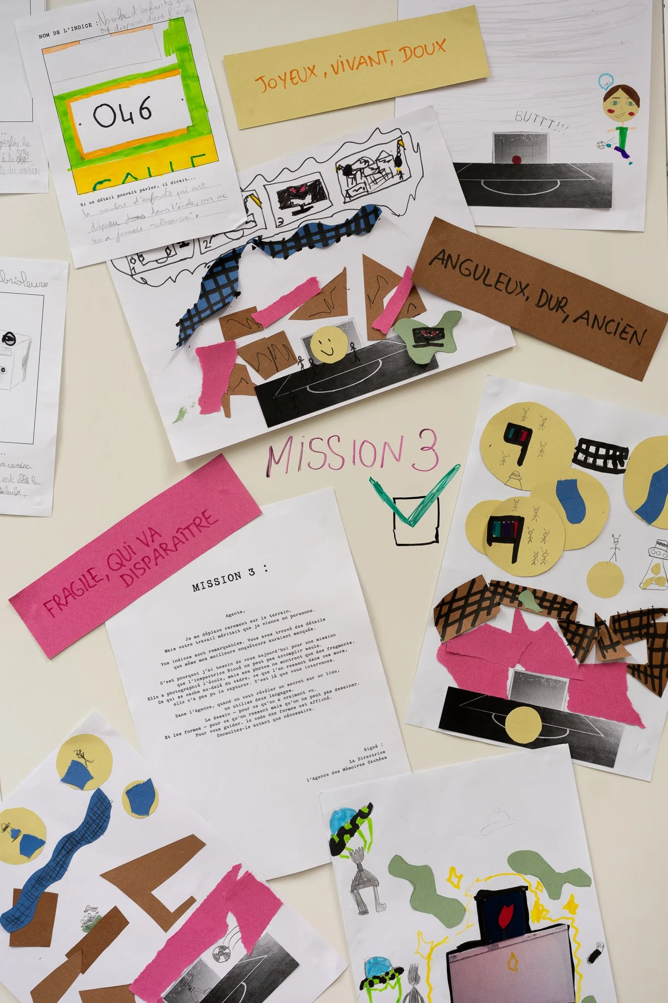 A collection of children's drawings, notes, and crafts related to a sports theme, including images of a soccer goal, a soccer player, and various abstract shapes and colors.