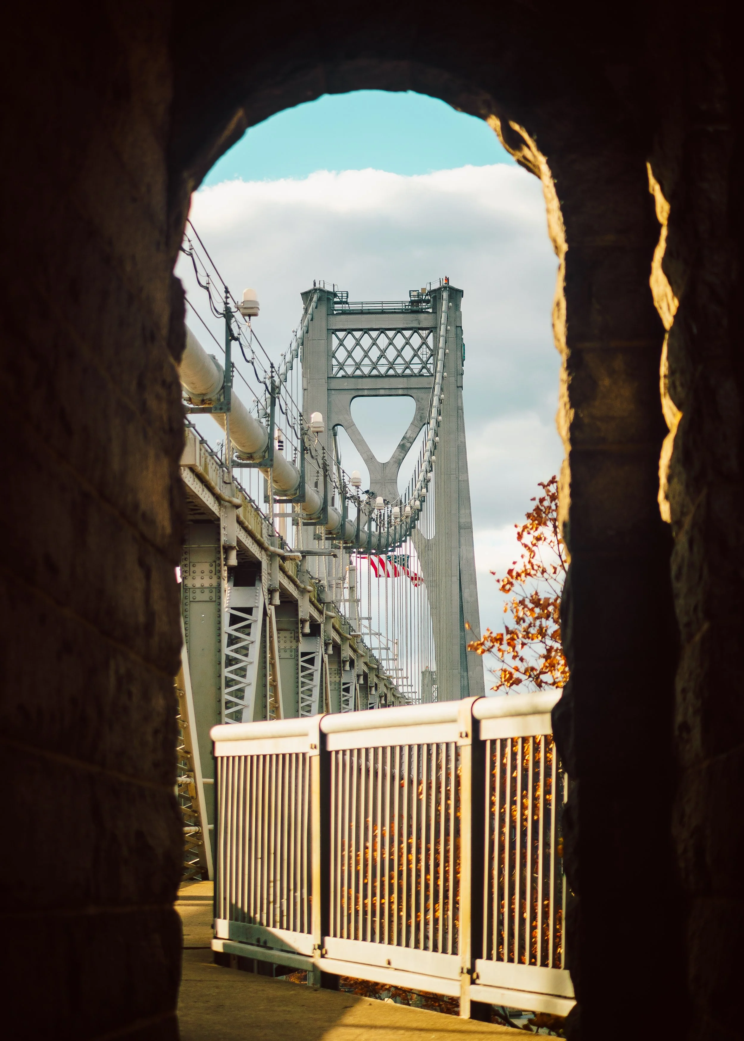 Mid-Hudson bridge framed by one of the arches of the walkway - outdoor landscape photography - Poughkeepsie, NY