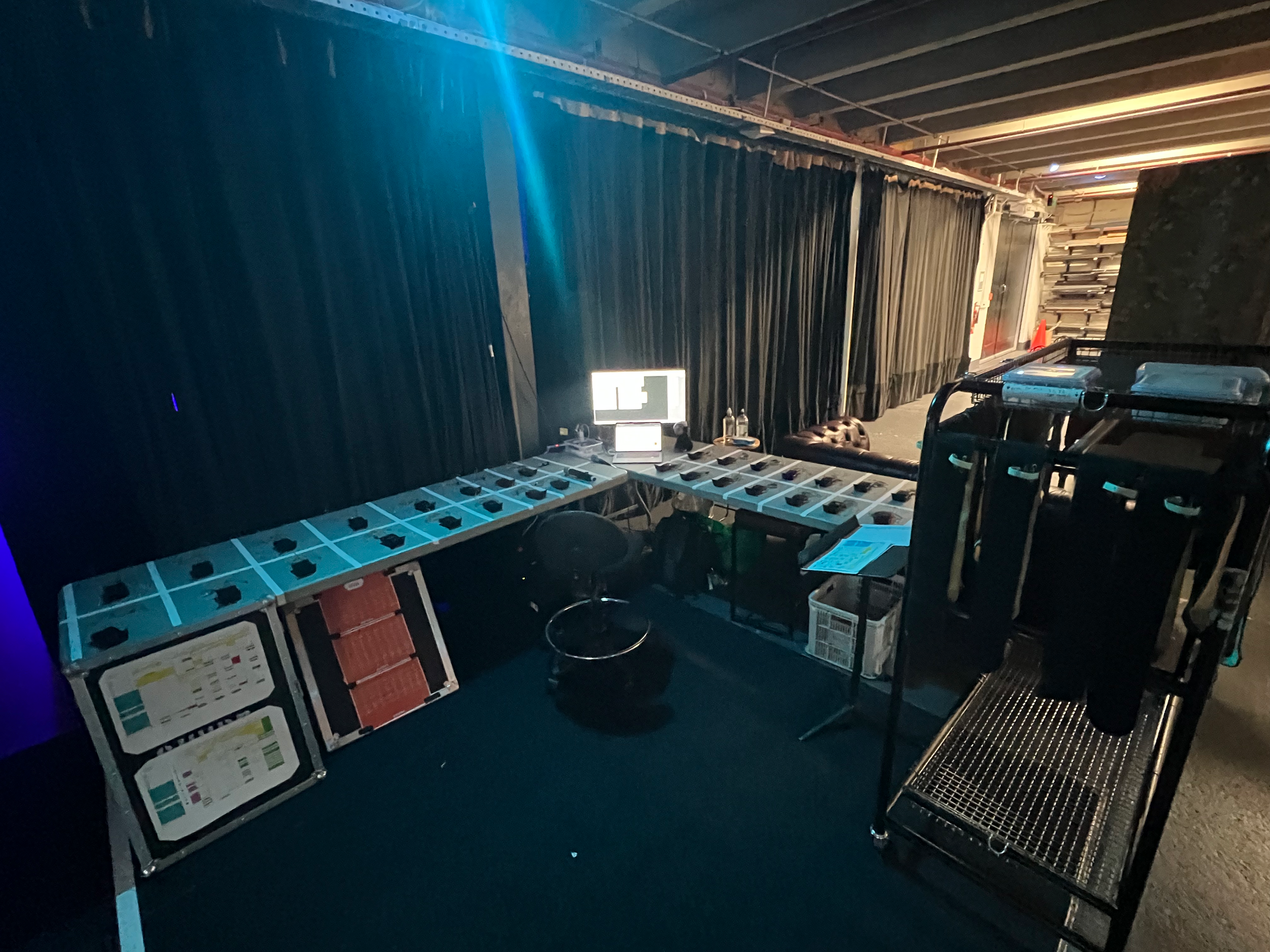 A photo of the backstage mic table at the Bruce Mason Centre for a youth production of Annie
