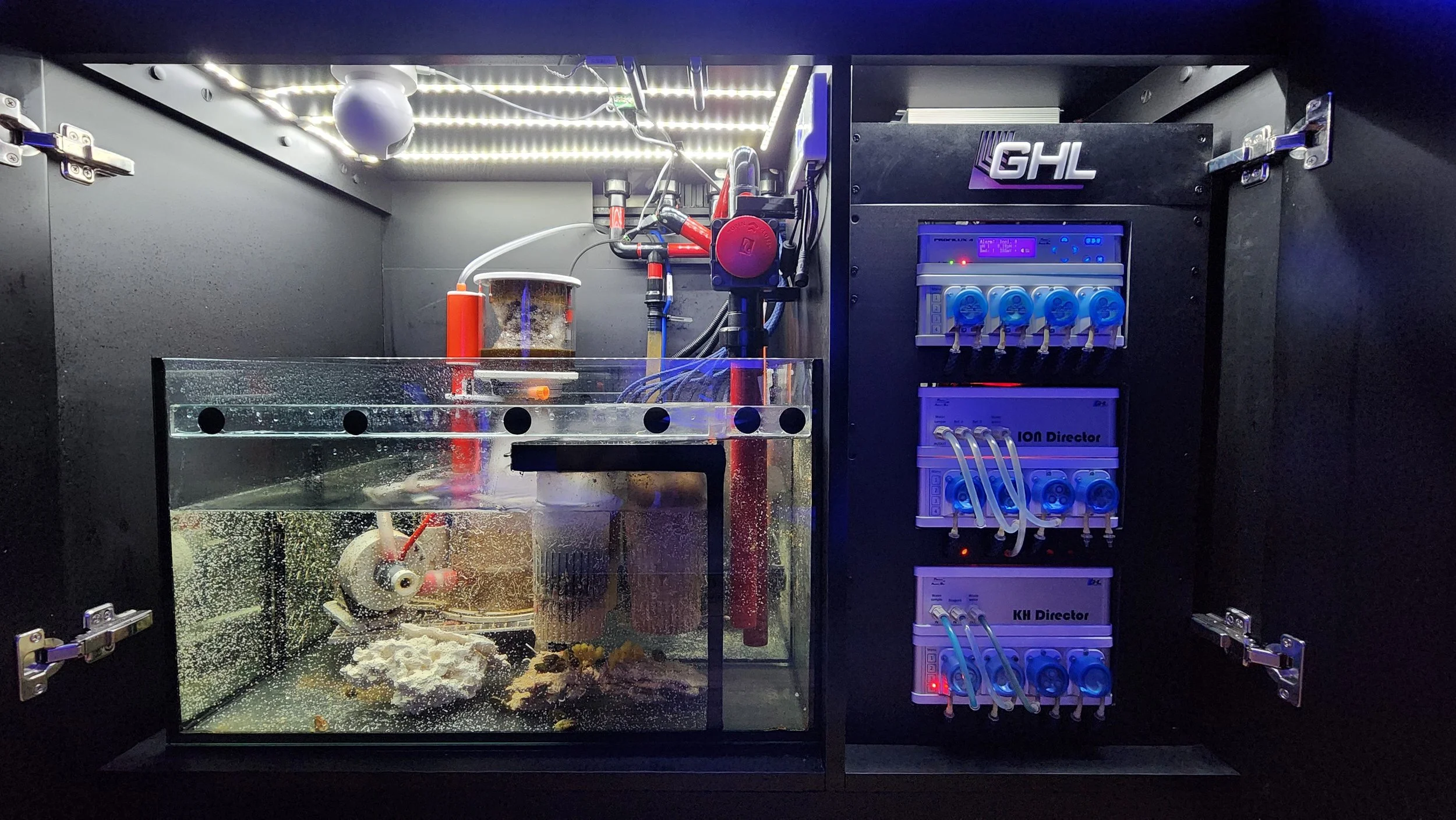 Automated reef aquarium control system with dosing, monitoring, and sump filtration for long-term stability