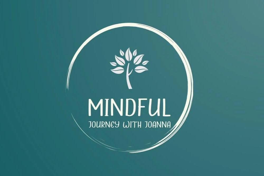 Logo for 'Mindful Journey with Joanna' featuring a stylized tree within a circular brushstroke on a teal background.