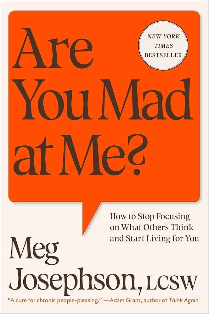 Book cover titled 'Are You Mad at Me?' by Meg Josephson, LCSW, with a subtitle 'How to Stop Focusing on What Others Think and Start Living for You'. The cover features an orange background with black and white text, and a circular sticker indicating it as a 'New York Times Bestseller.'