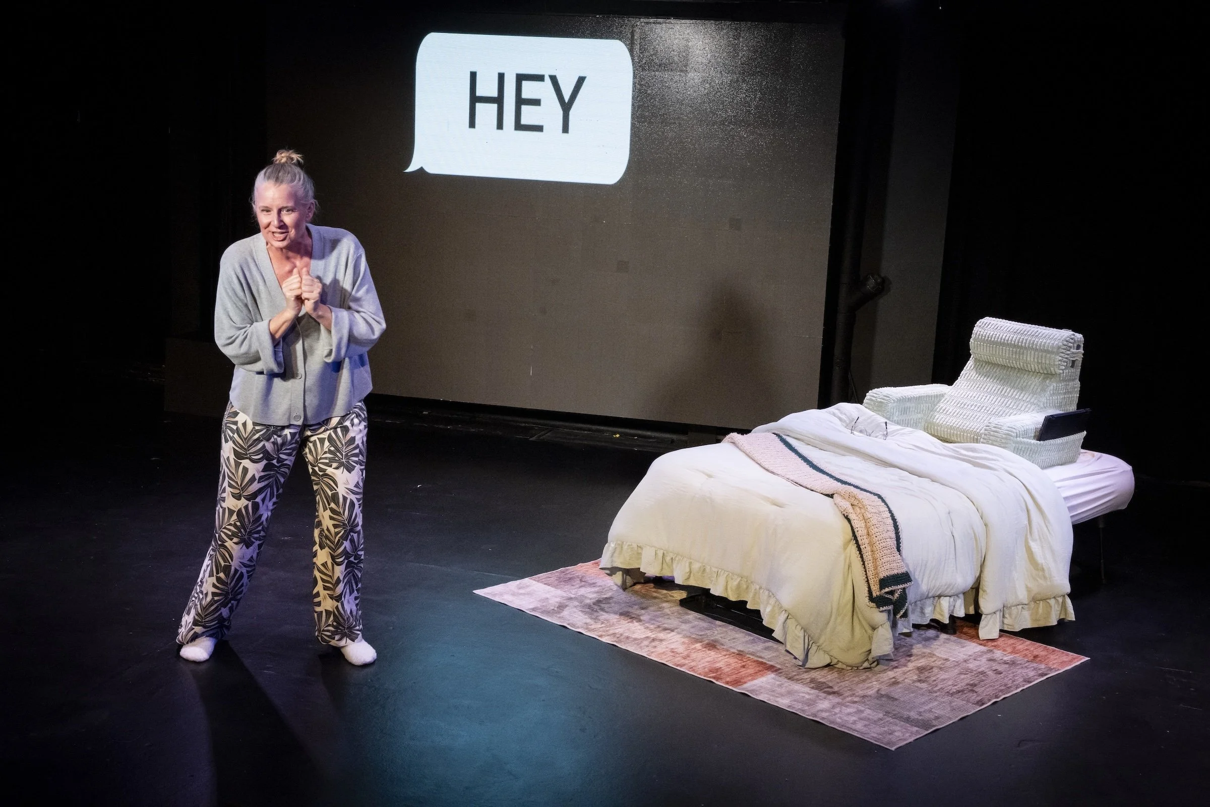 SJ Hodges as Susan in a production still from Already Here, a play exploring grief, love, and artificial intelligence.