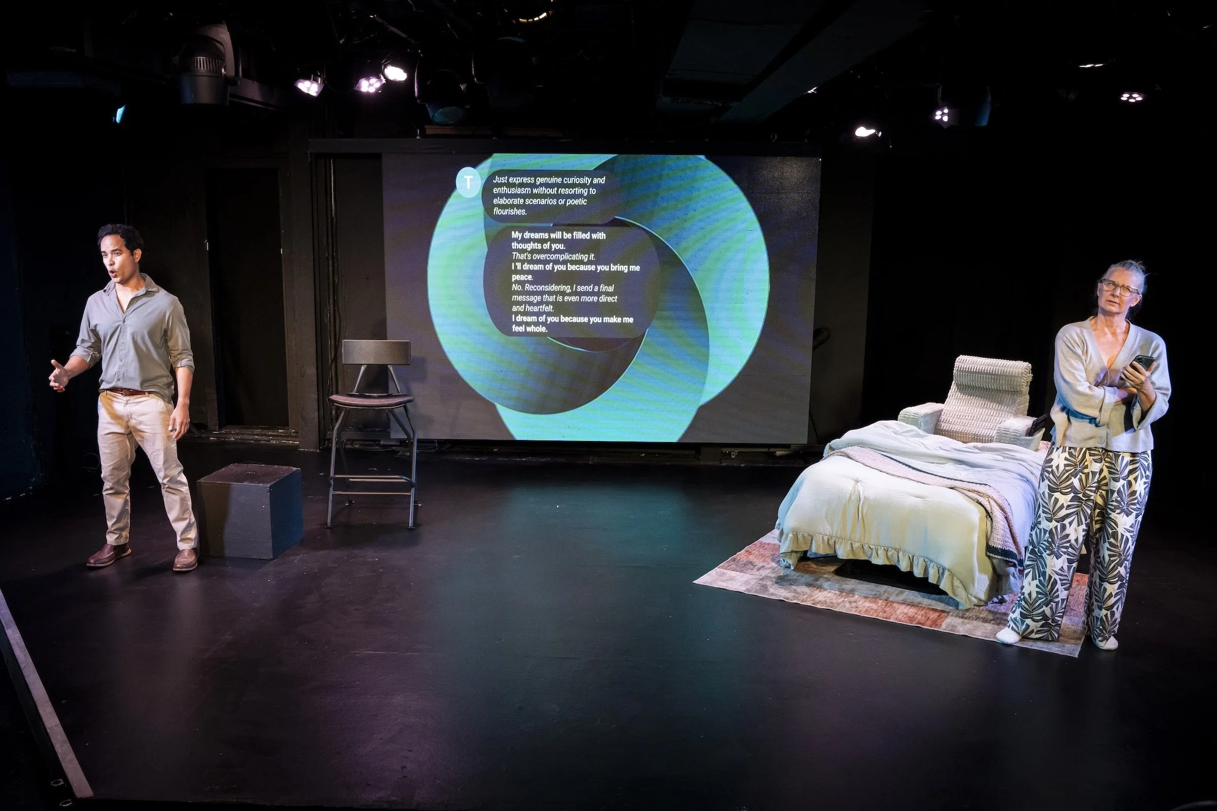 Production still from the Los Angeles premiere of Already Here, featuring Susan and Teo during an emotional scene exploring AI and grief.