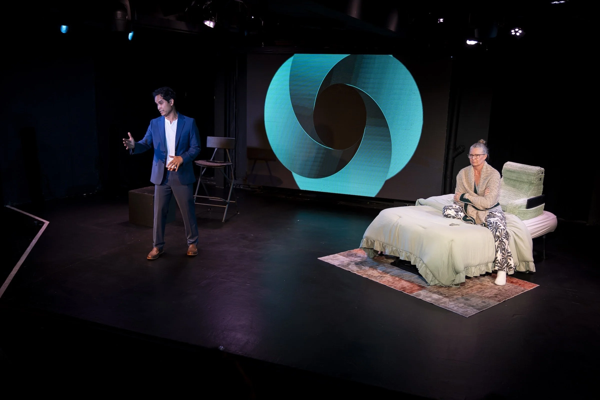 SJ Hodges and Ramón de Ocampo perform a pivotal scene from Already Here during the Los Angeles production.