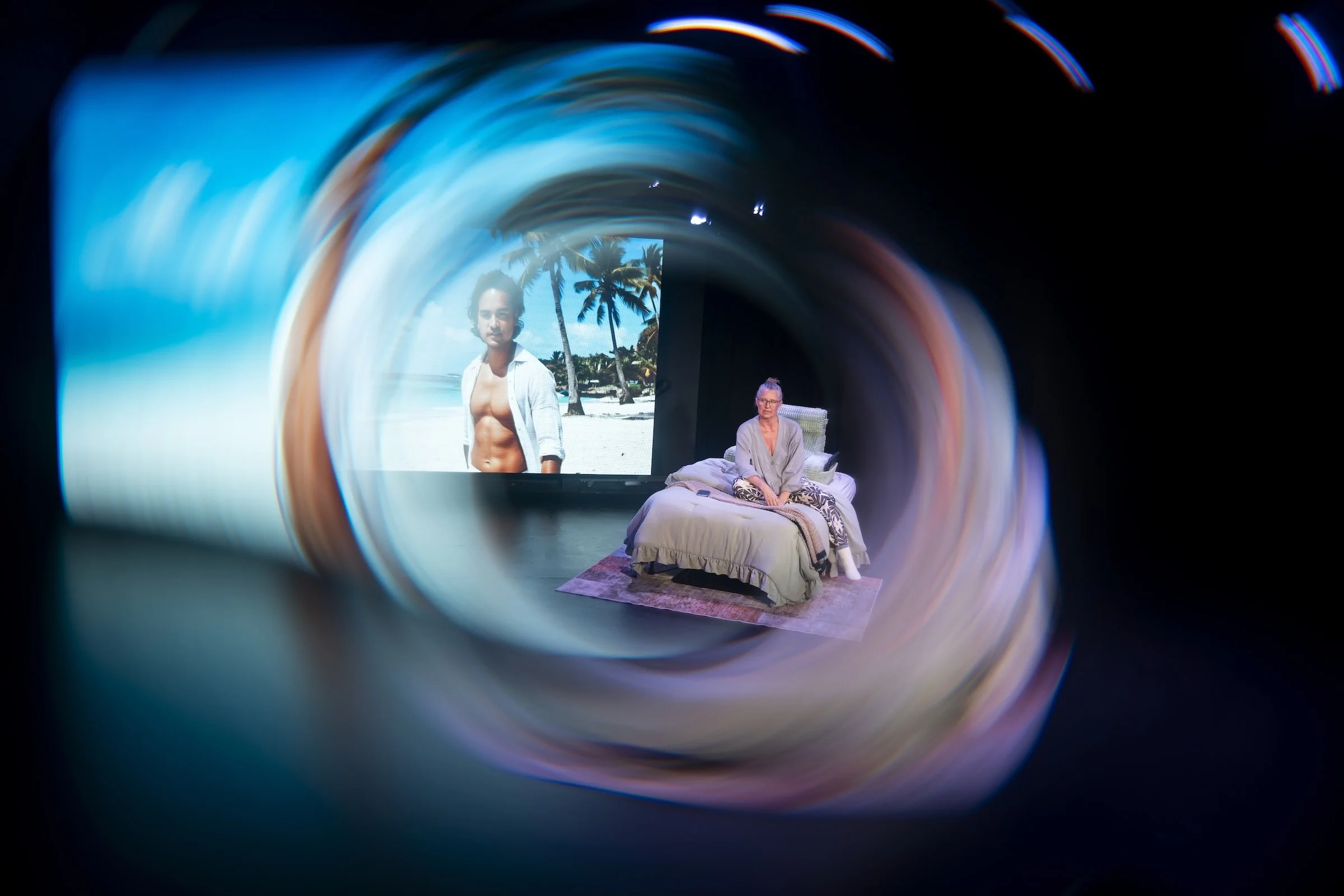 SJ Hodges as Susan with Ai Matteo in a production still from Already Here, a play exploring grief, love, and artificial intelligence.