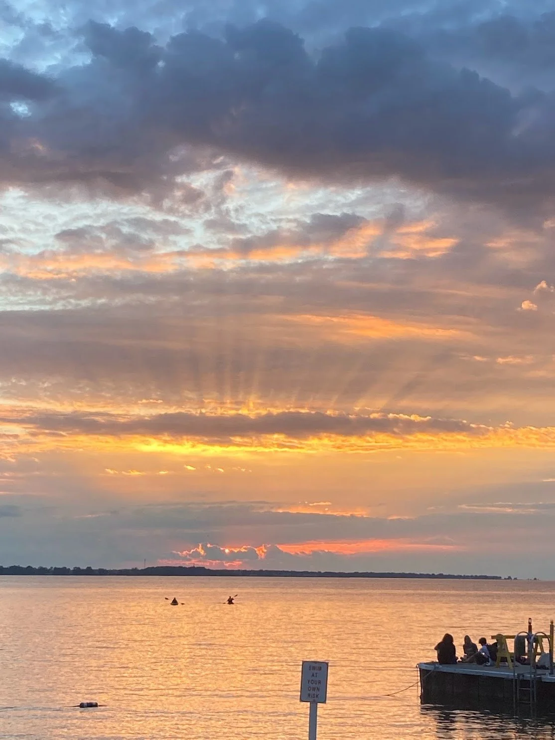sunset sun rays over lake erie
