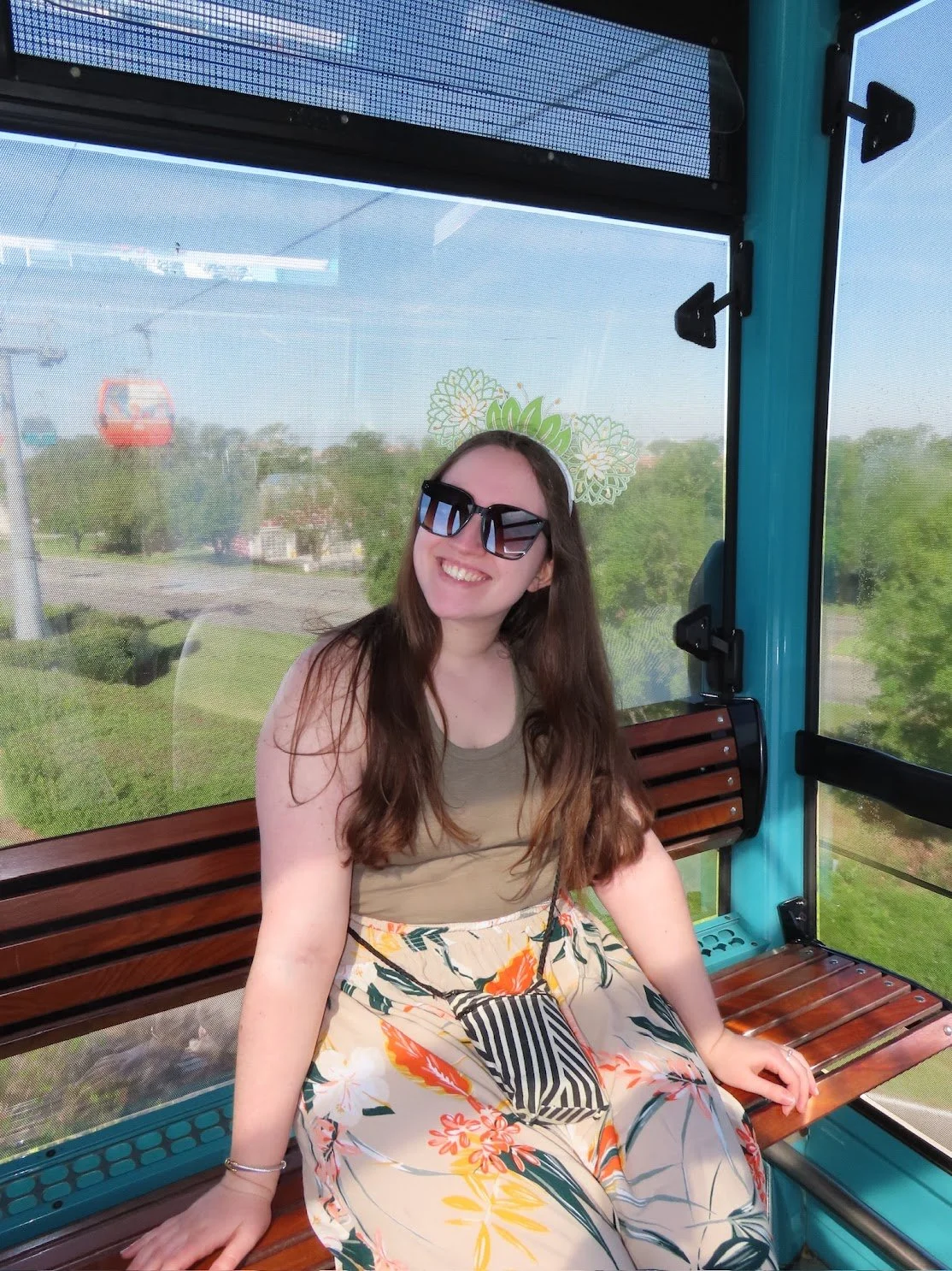 Traveler on the Skyliner in Walt Disney World.