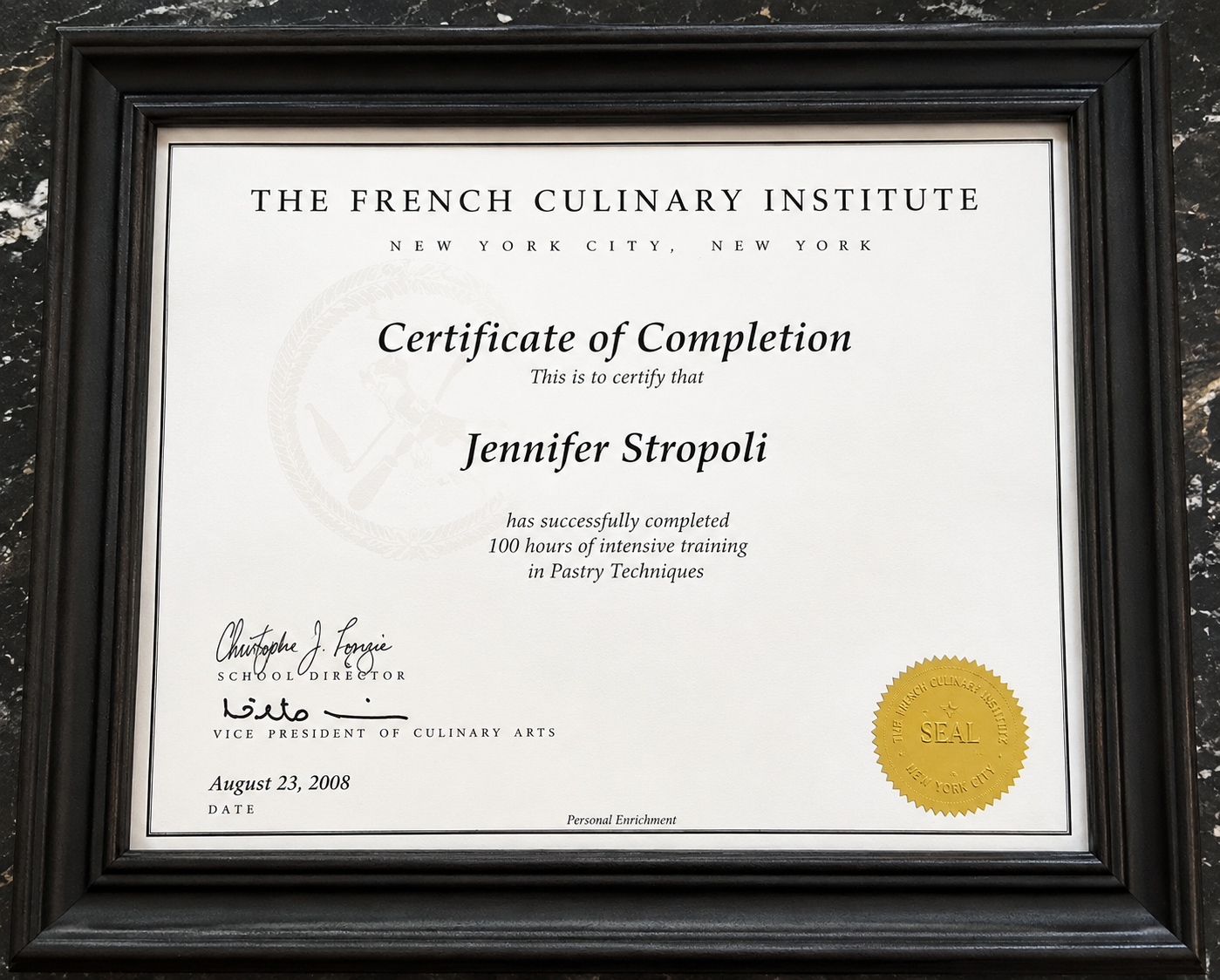 Certificate of completion from The French Culinary Institute awarded to Jennifer Stropoli for 100 hours of pastry techniques training, signed by Christophe J. Forgie and Leto, with a gold seal at the bottom right.
