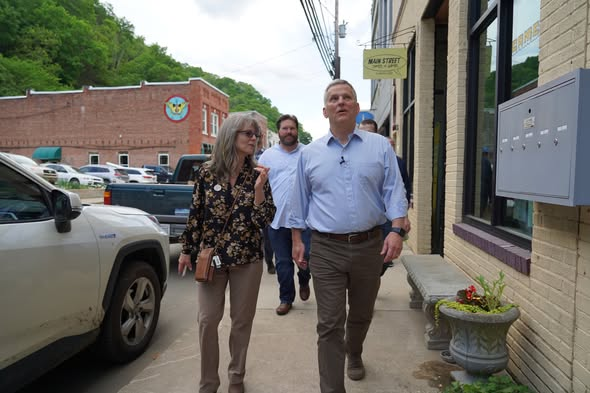 Connie Molland, Candidate for Madison County Commissioner 2026 talking to Josh Stein, governer of North Carolina.