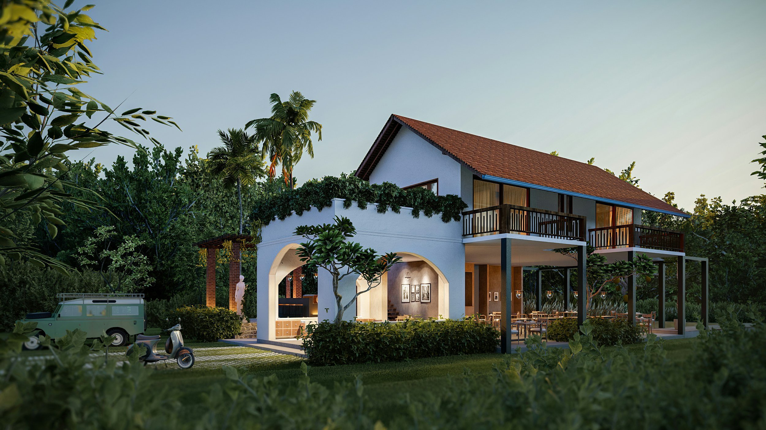 A modern two-story house with a red tiled roof, white walls, and wooden balconies, surrounded by lush greenery and trees, with outdoor seating and decorative lighting.