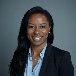 Headshot of Mona Sullivan smiling.