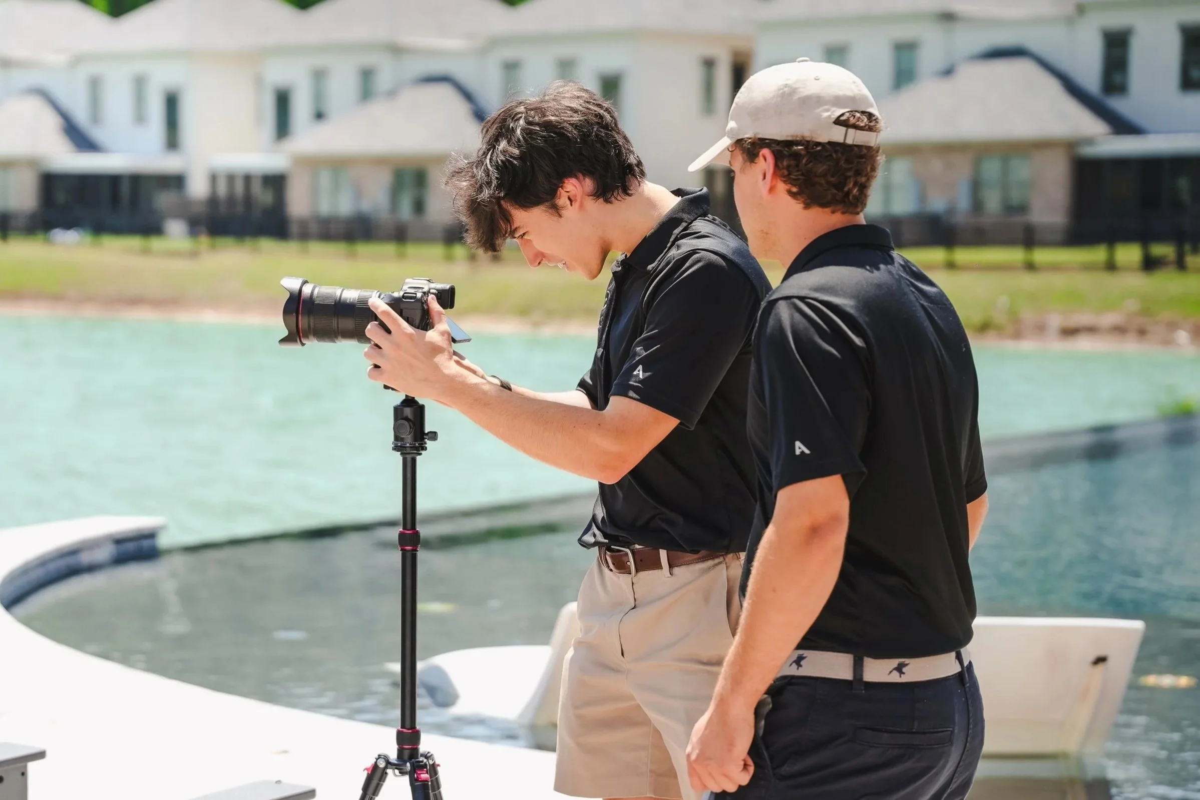 Evan Farrell and Jonathon Thurman of Oxford Marketing working on a photo campaign for Wellington Place Luxury Townhomes.