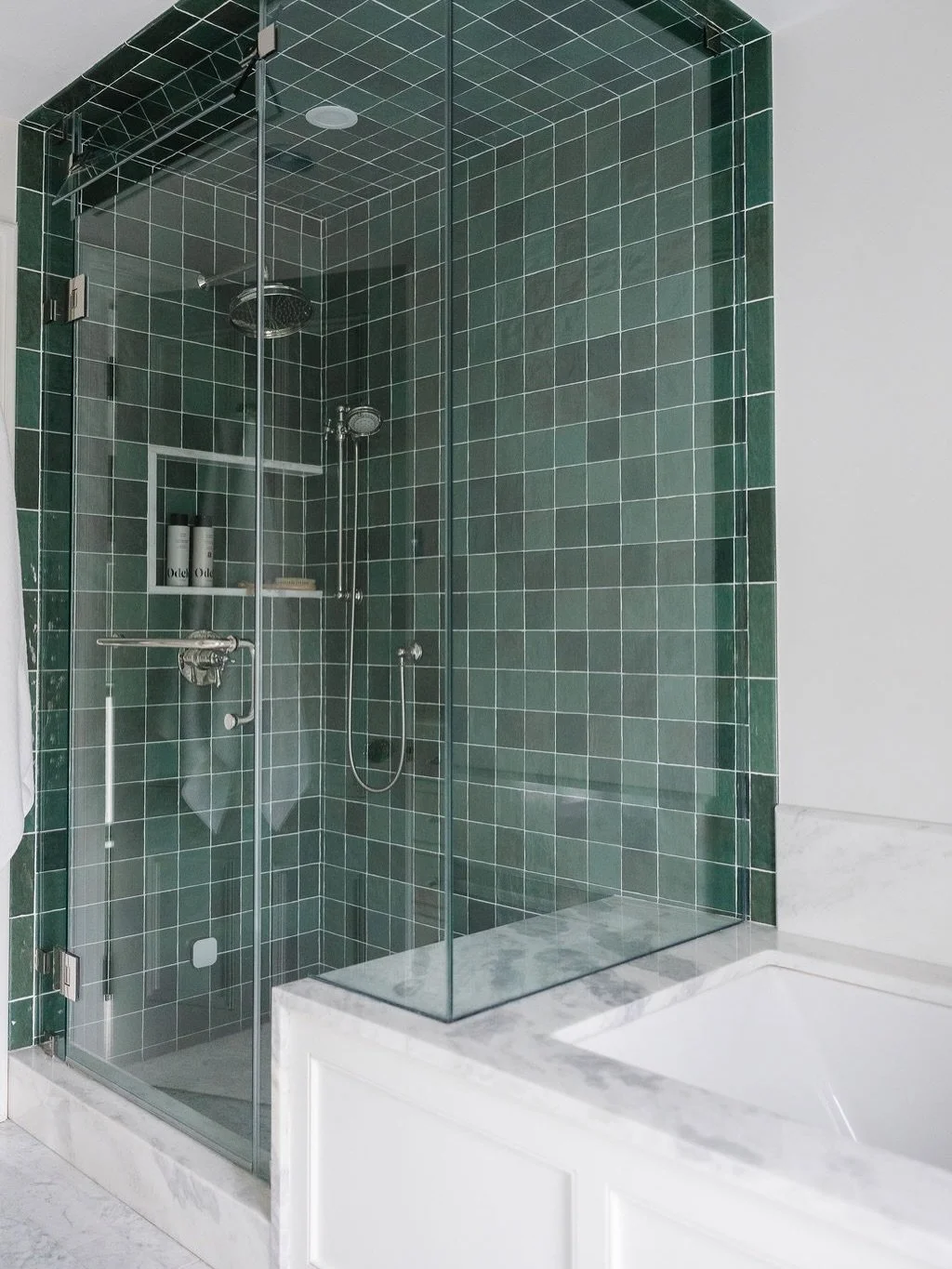 Subtle and bold all at once. These photos of the primary bathroom at our Pine street project always stop me in my tracks and I find myself having bathroom envy all over again.  Hand glazed tile, Carrara marble, polished nickel plumbing, hidden medici
