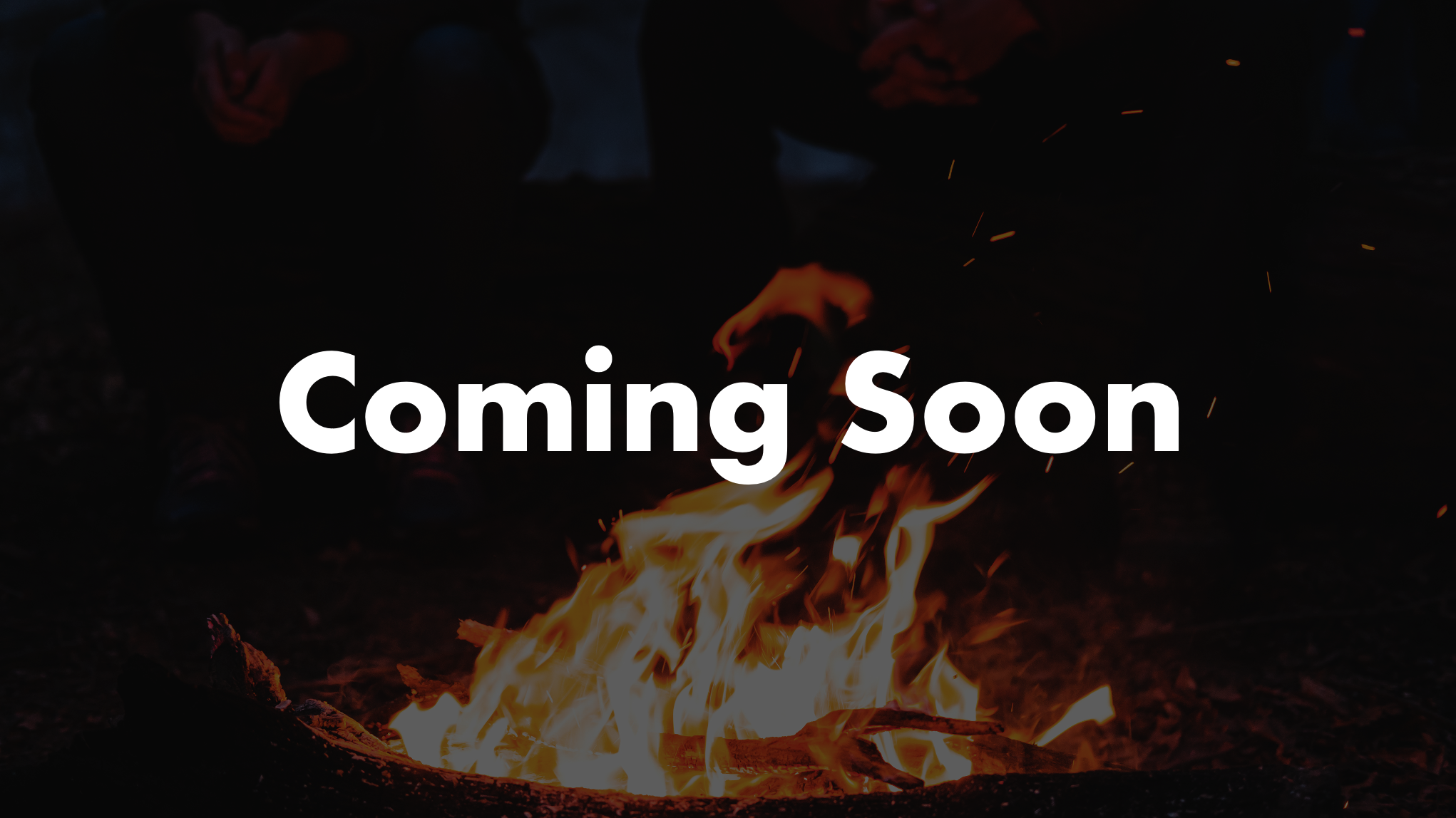 A campfire with flames and sparks, with the words 'Coming Soon' written across the image.