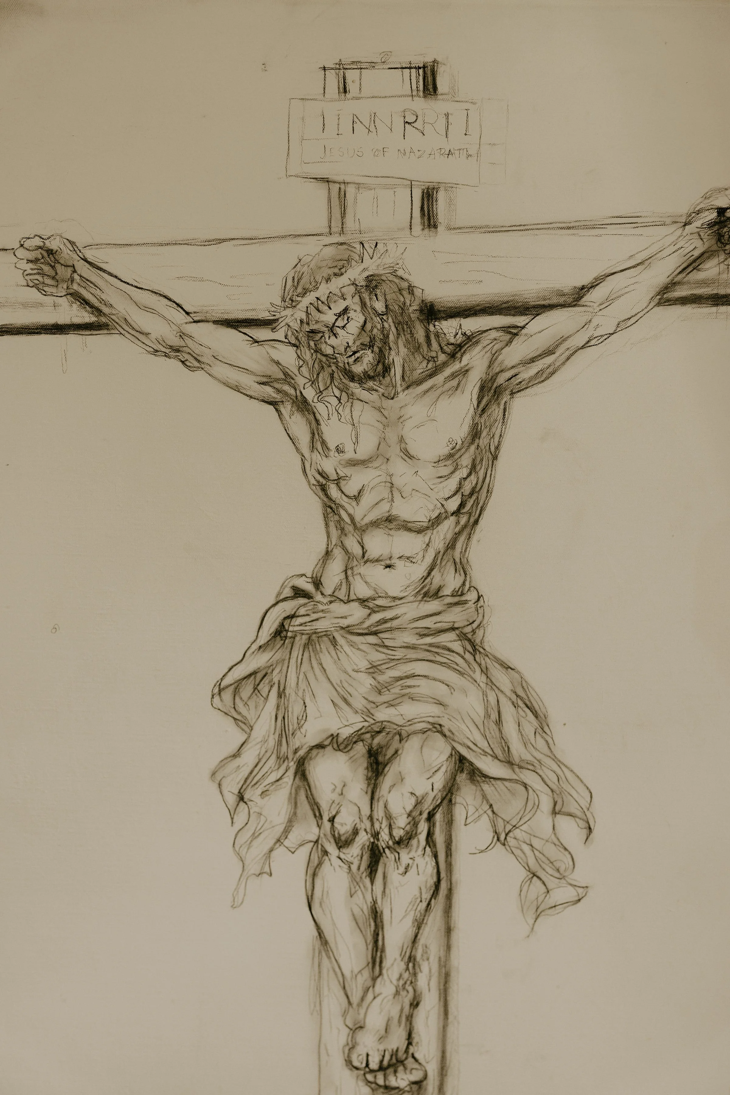 The Crucifixion - Three Days Series . A sign above reads 'INRI' and 'Jesus of Nazareth'. Charcoal on Canvas