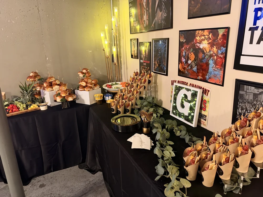 Charcuterie display and greenery at the vow renewal