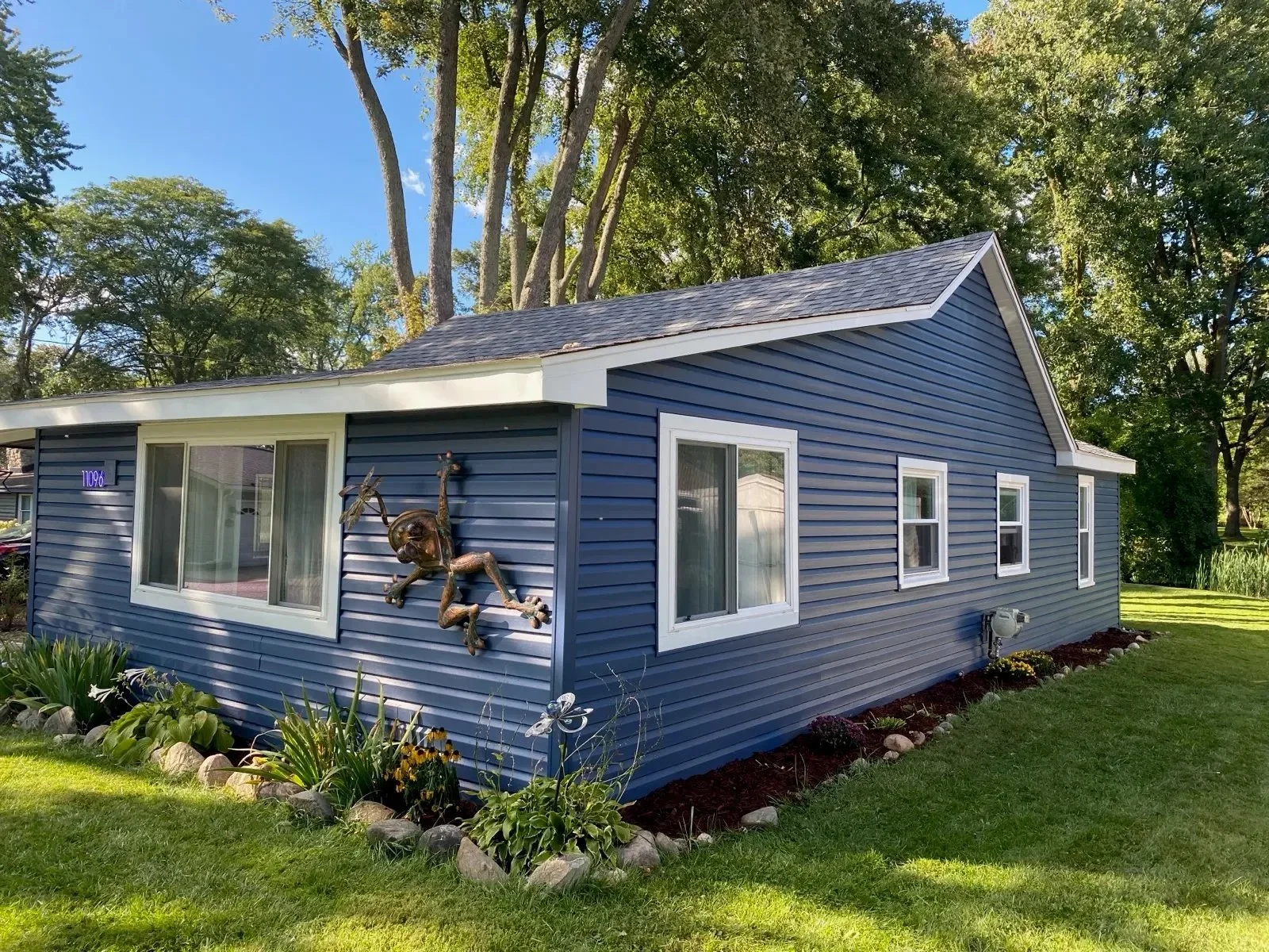 Custom home addition blending seamlessly with existing structure