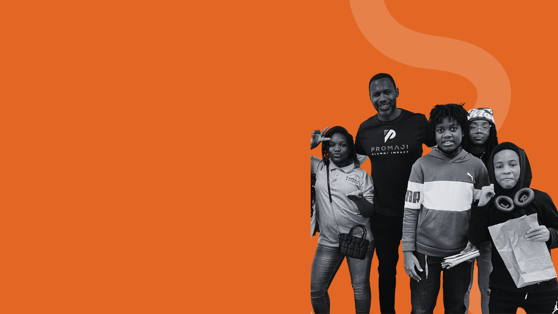 A group of five diverse people, including children and an adult, standing together against an orange background. The adult is smiling and wearing a black T-shirt with "PROMAJI" logo, while the children have various expressions and are holding items such as headphones, a paper bag, and a small purse.