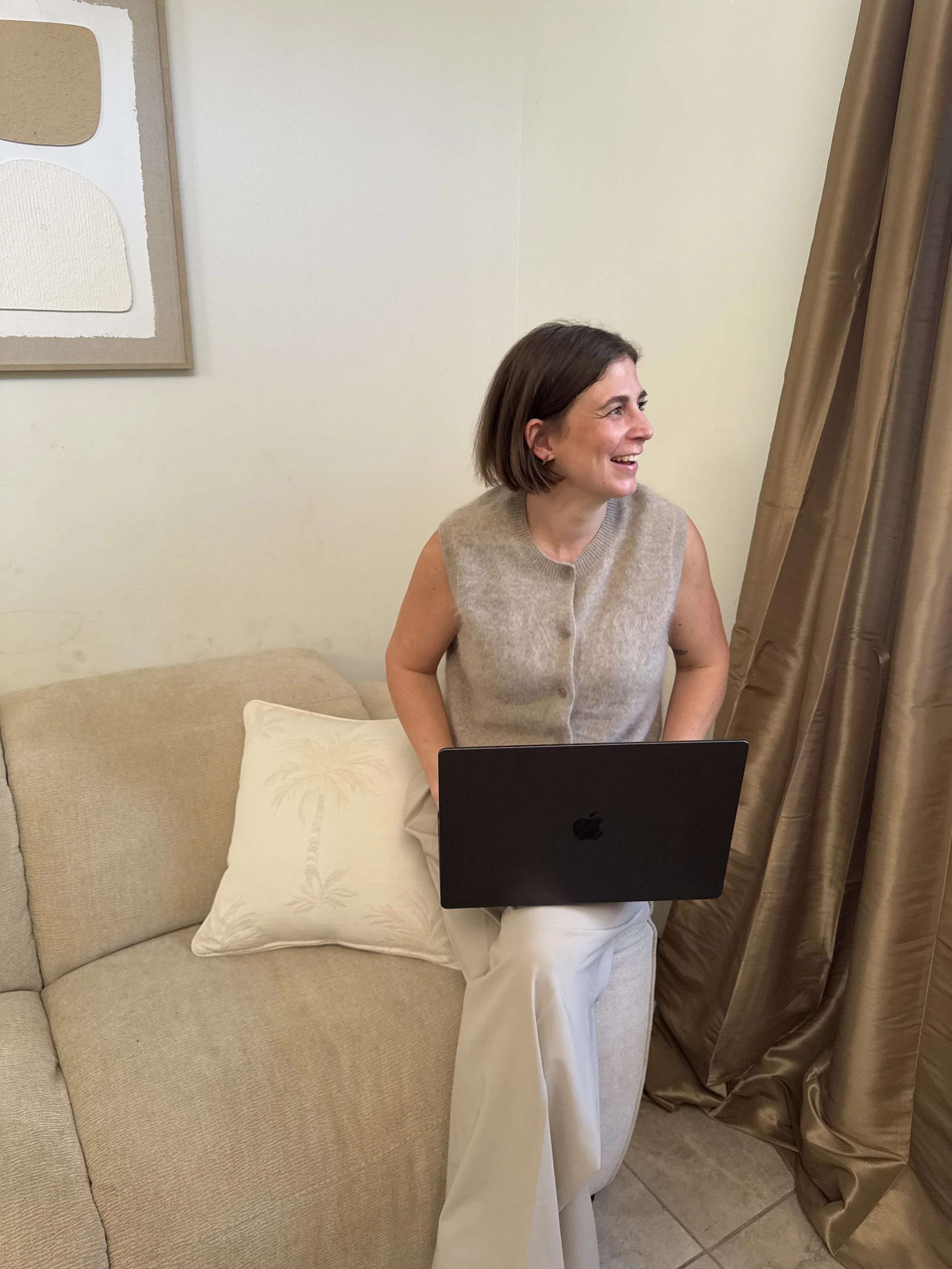 Woman learning SketchUp on laptop from home interior design course