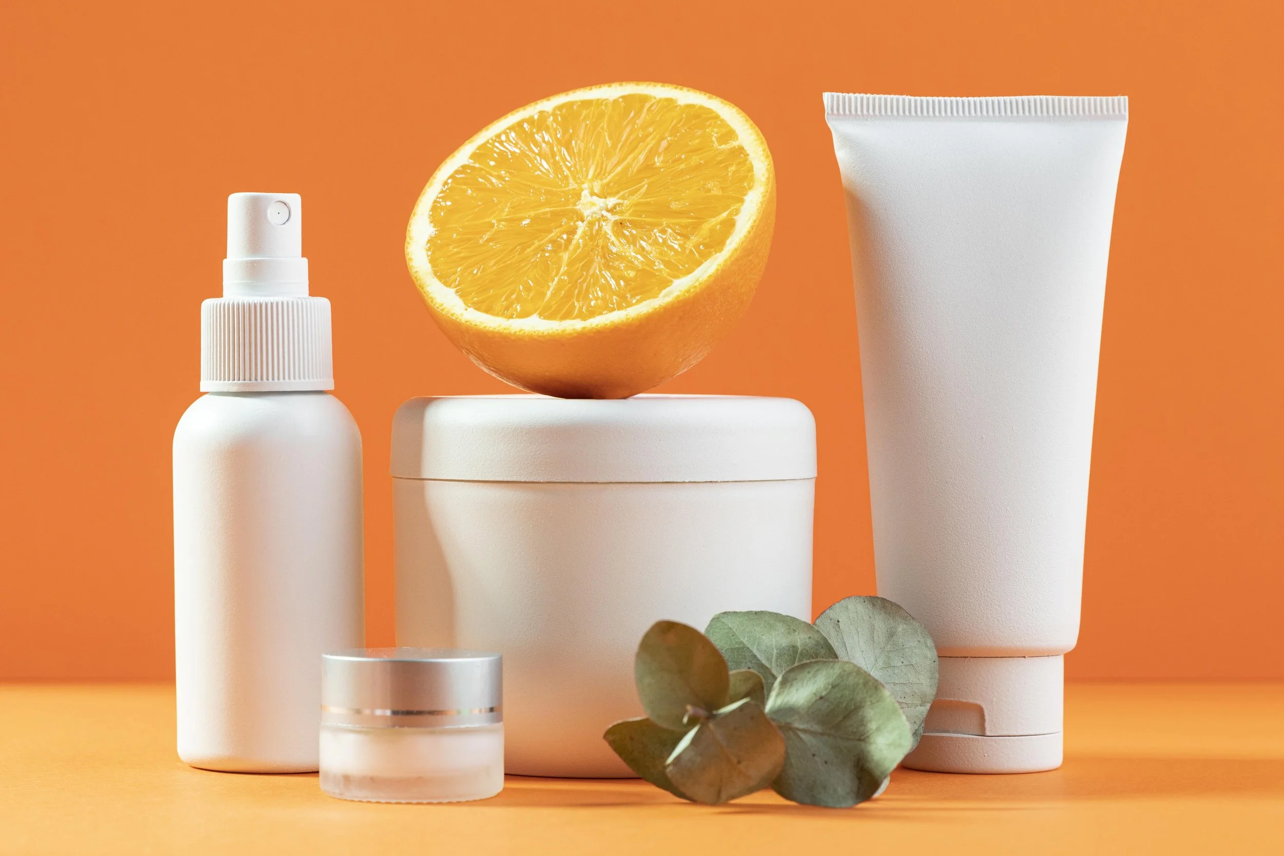 cosmetic-containers-with-half-orange.jpg