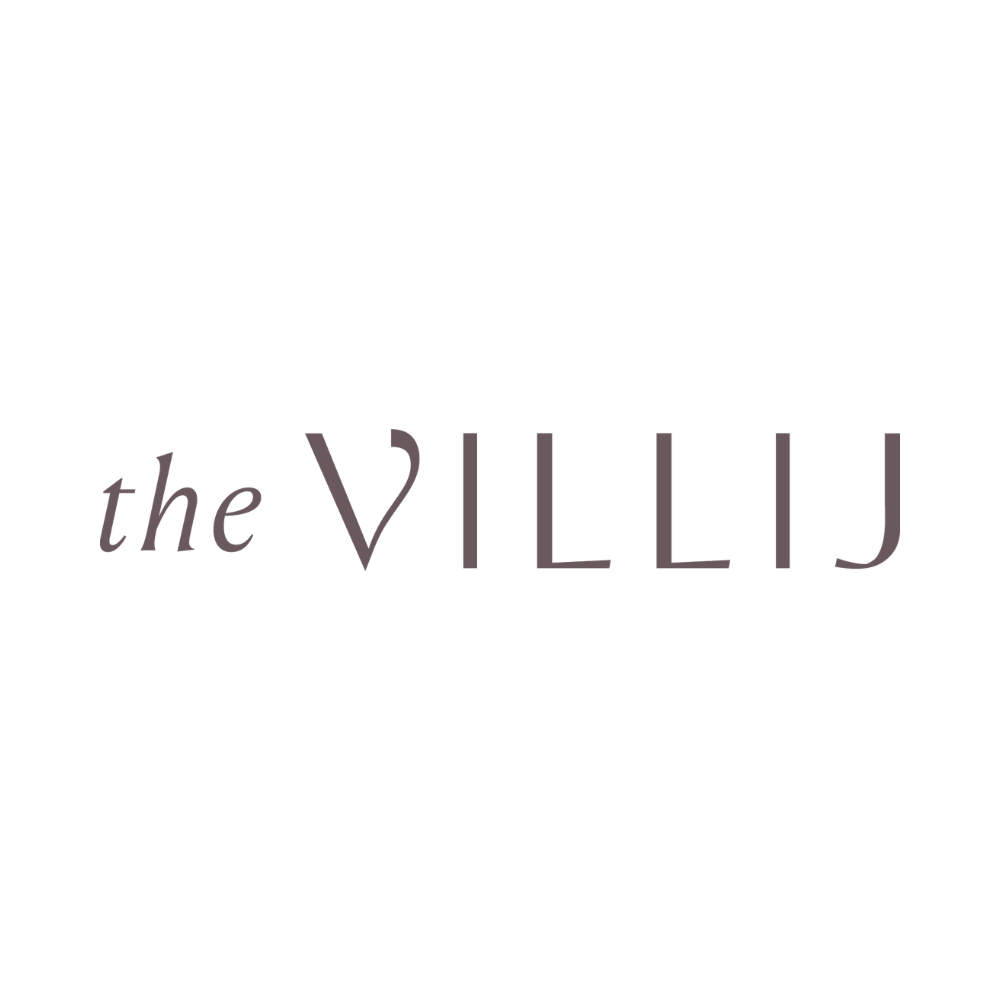 Logo for 'The Villij' with stylized text and decorative elements in black and gray.