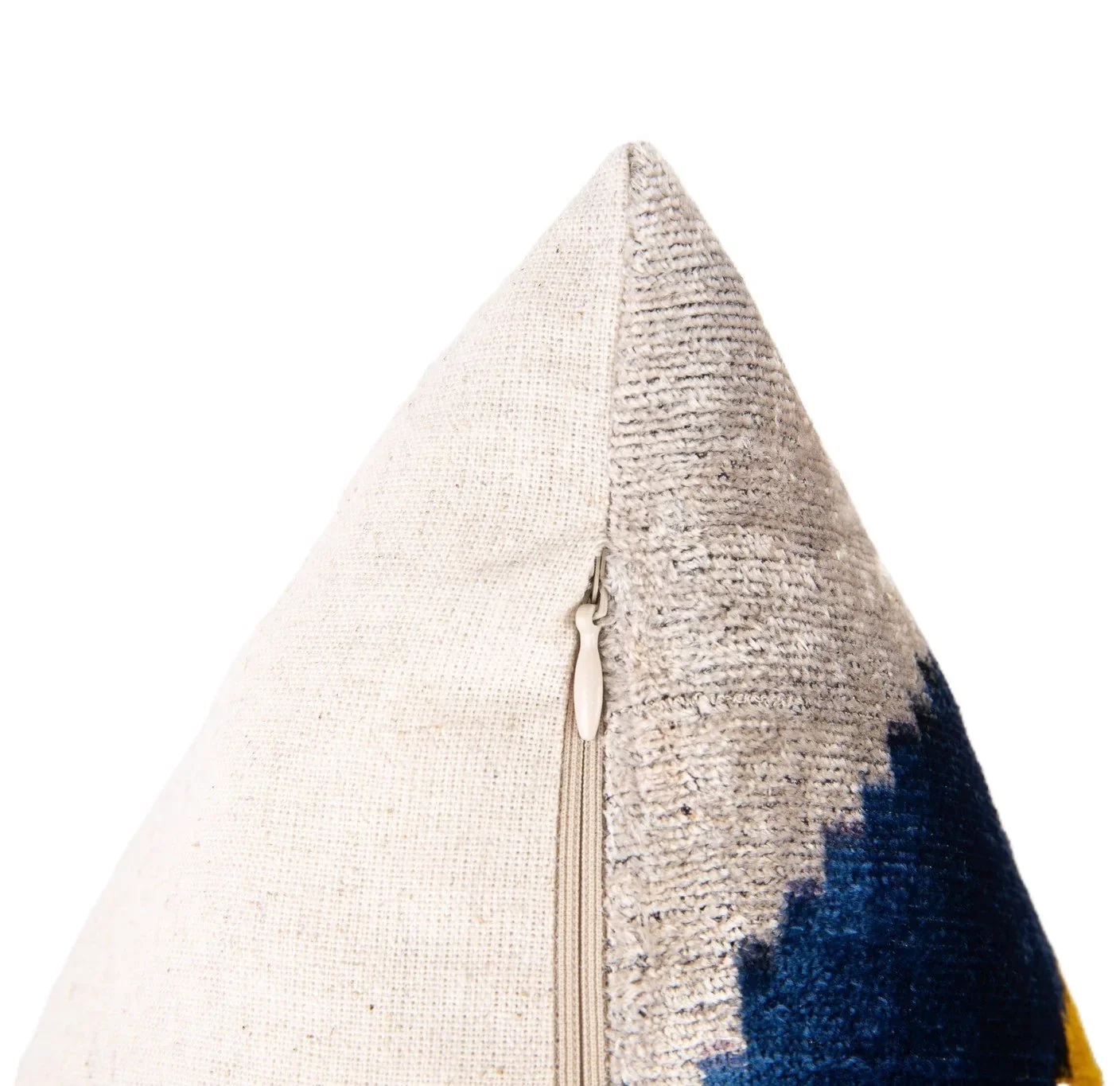 closeup-textured-fabric-pillow-zipper-blue-pattern
