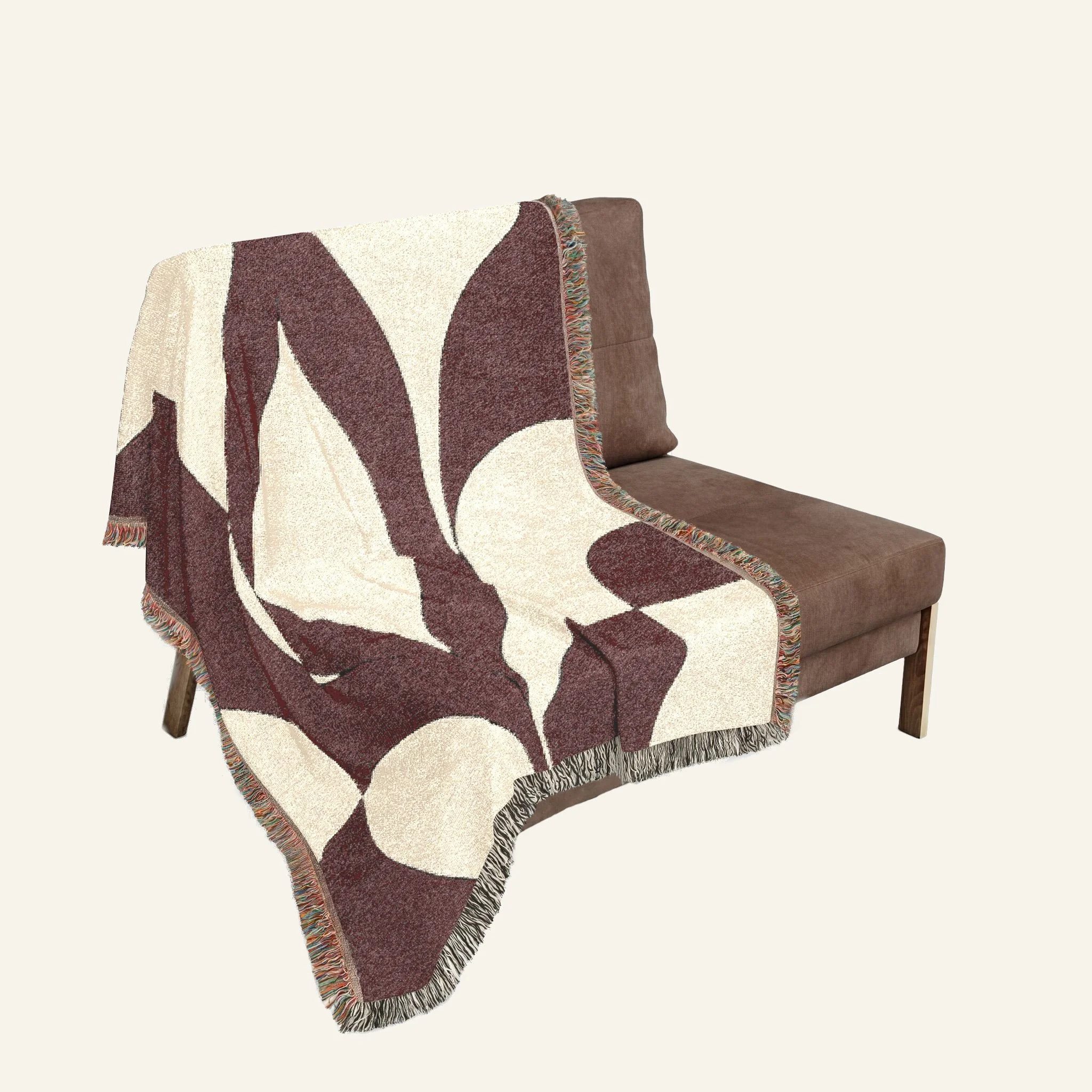 Serein Japandi woven blanket draped over bed showing geometric pattern