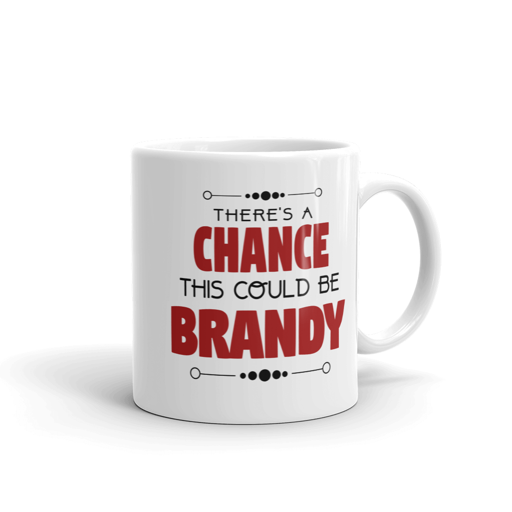 Ceramic coffee mug with handle on right side showing brandy-themed text