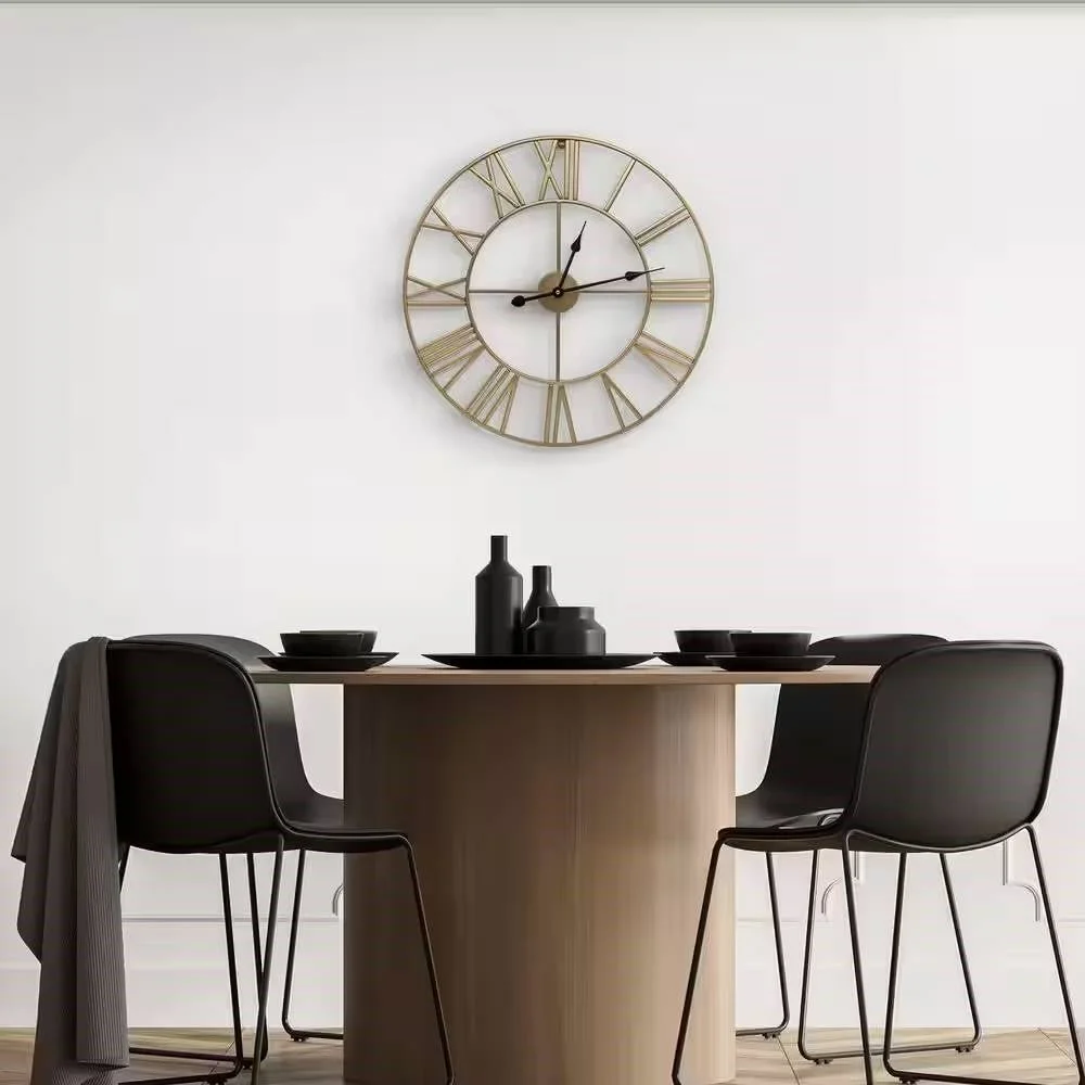 Side angle of 24-inch gold metal wall clock showing thin black hands