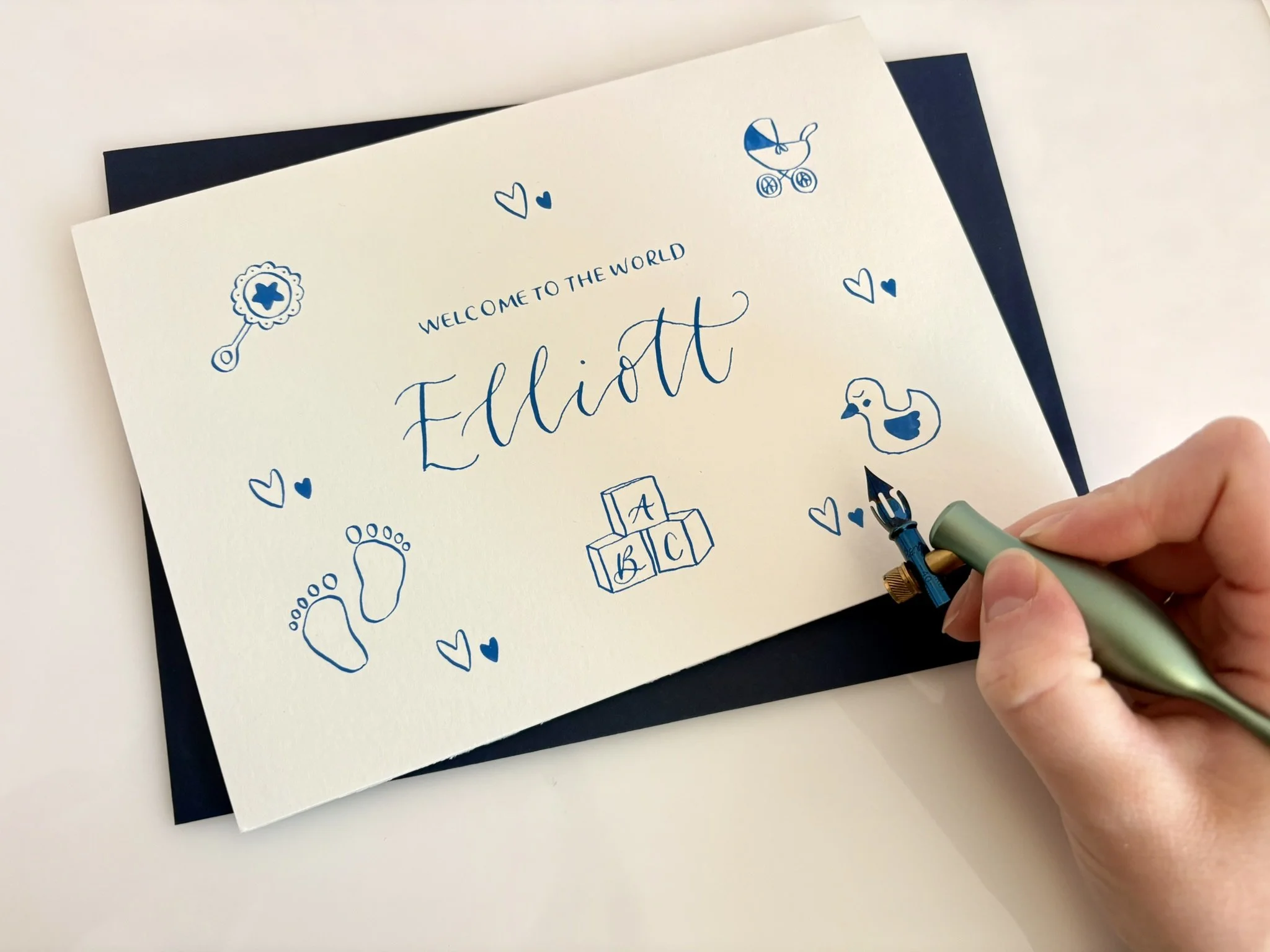 New Baby card with calligraphy and illustration