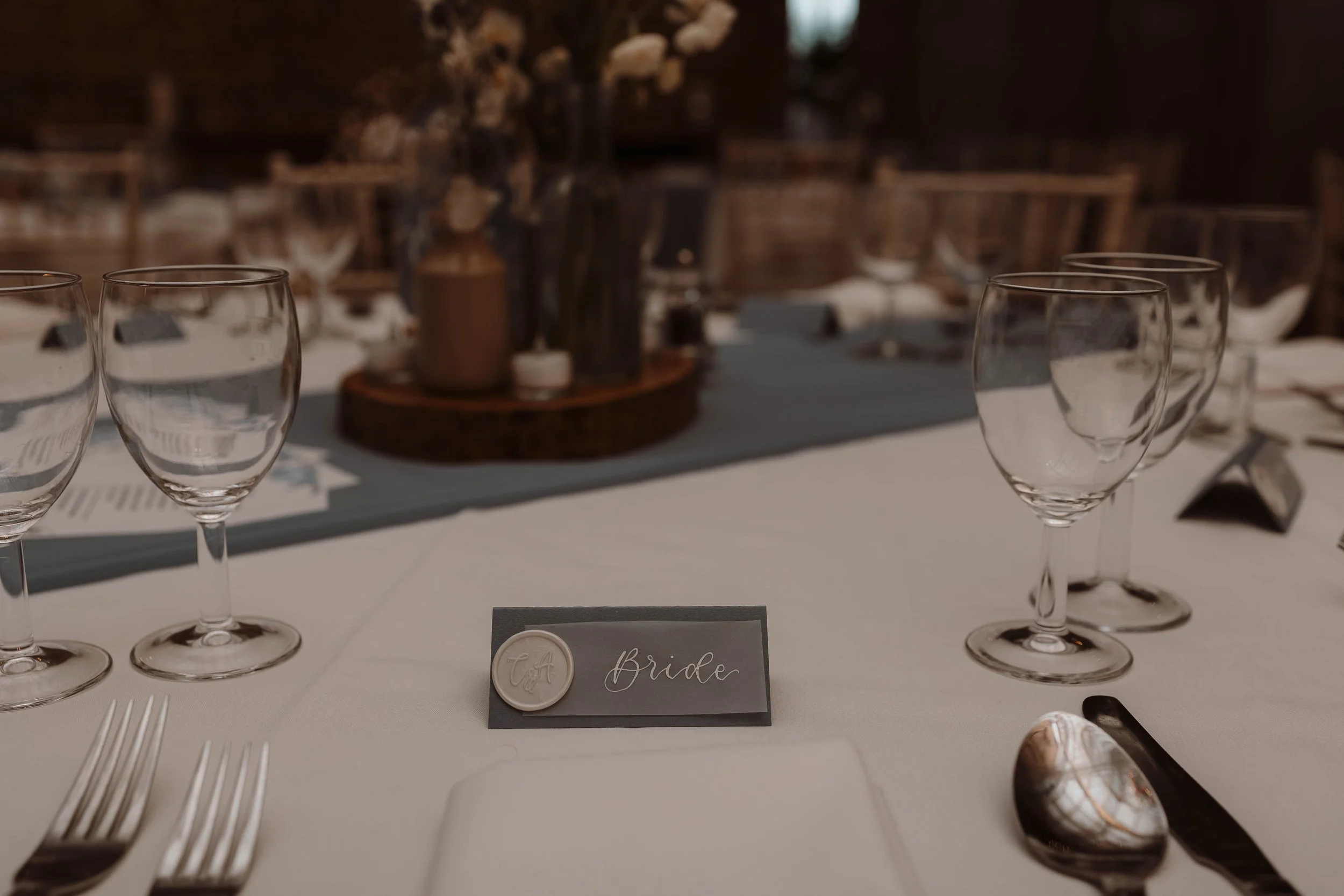 Wedding place name with 'Bride' written in calligraphy
